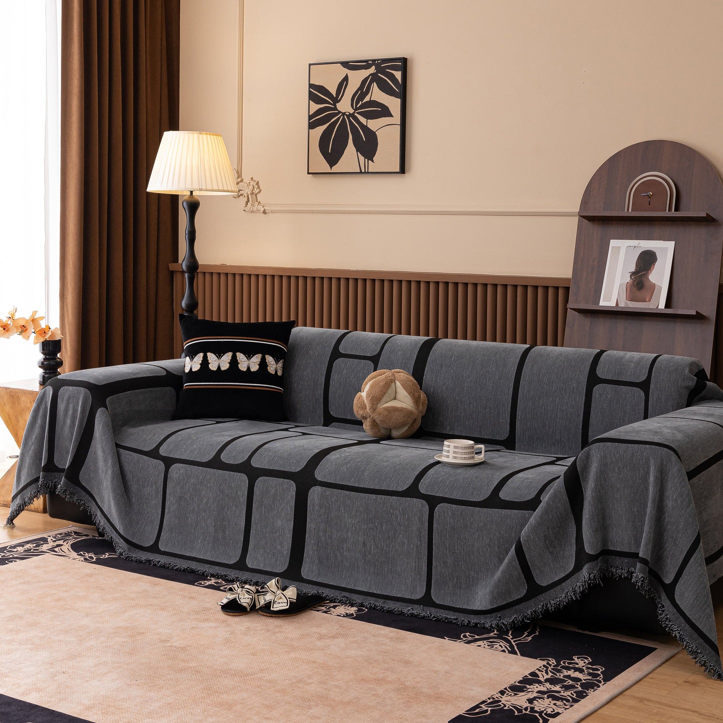 Modern Geometric Sofa Cover Decorative Couch Throw Blanket Furniture Protector in a stylish living room setting with tassel edges.