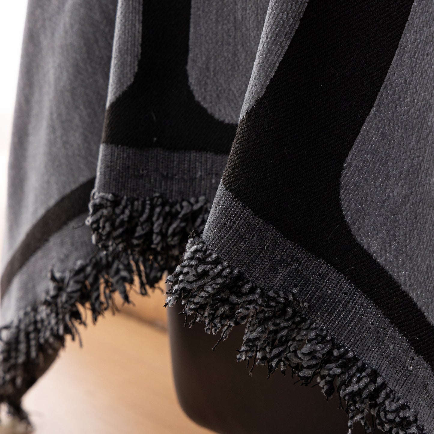Close-up of Modern Geometric Sofa Cover Decorative Couch Throw Blanket Furniture Protector with tassel edges