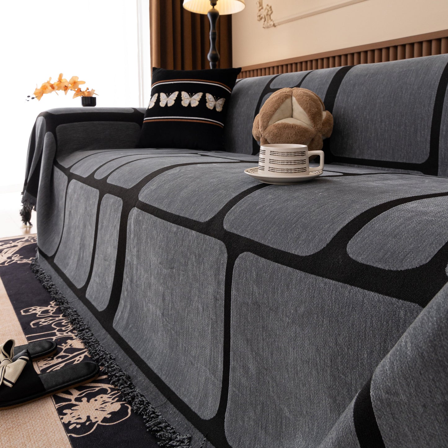 Modern Geometric Sofa Cover Decorative Couch Throw Blanket Furniture Protector on a stylish living room sofa.