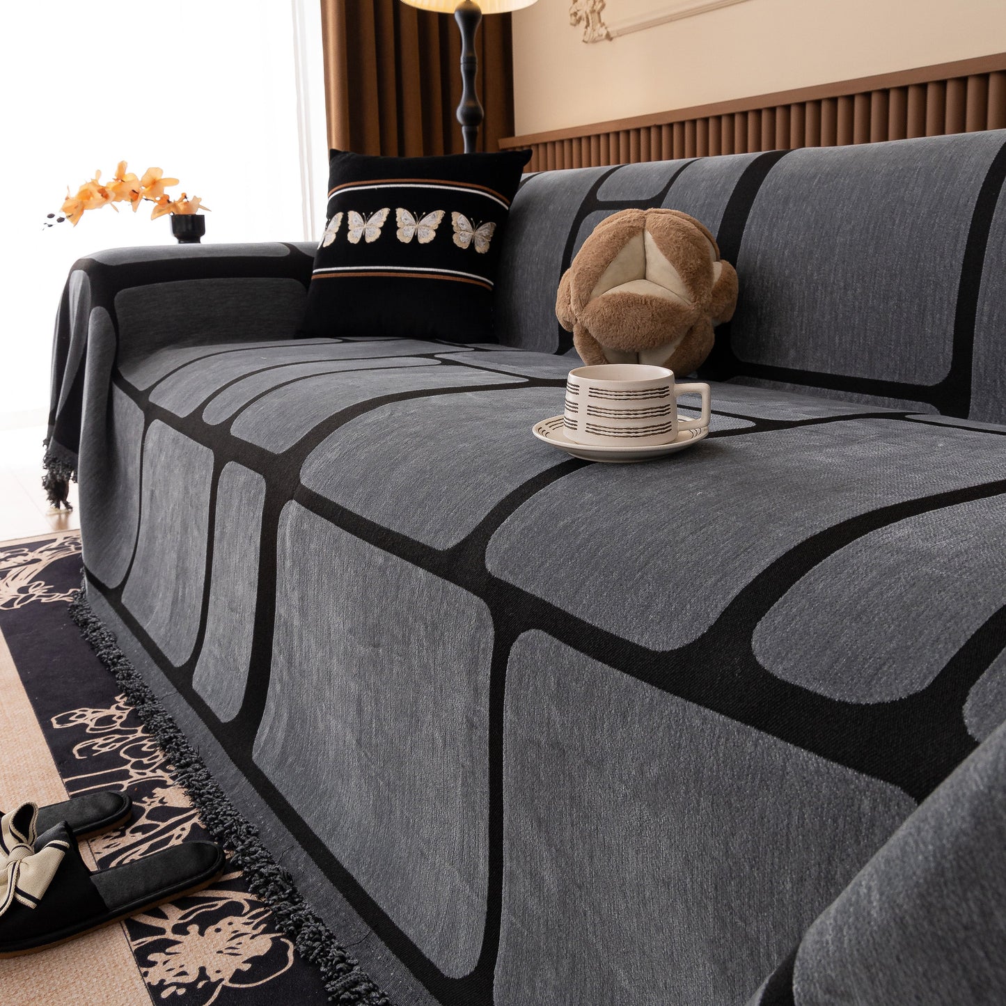 Modern Geometric Sofa Cover Decorative Couch Throw Blanket Furniture Protector in grey chenille with geometric pattern and tassels