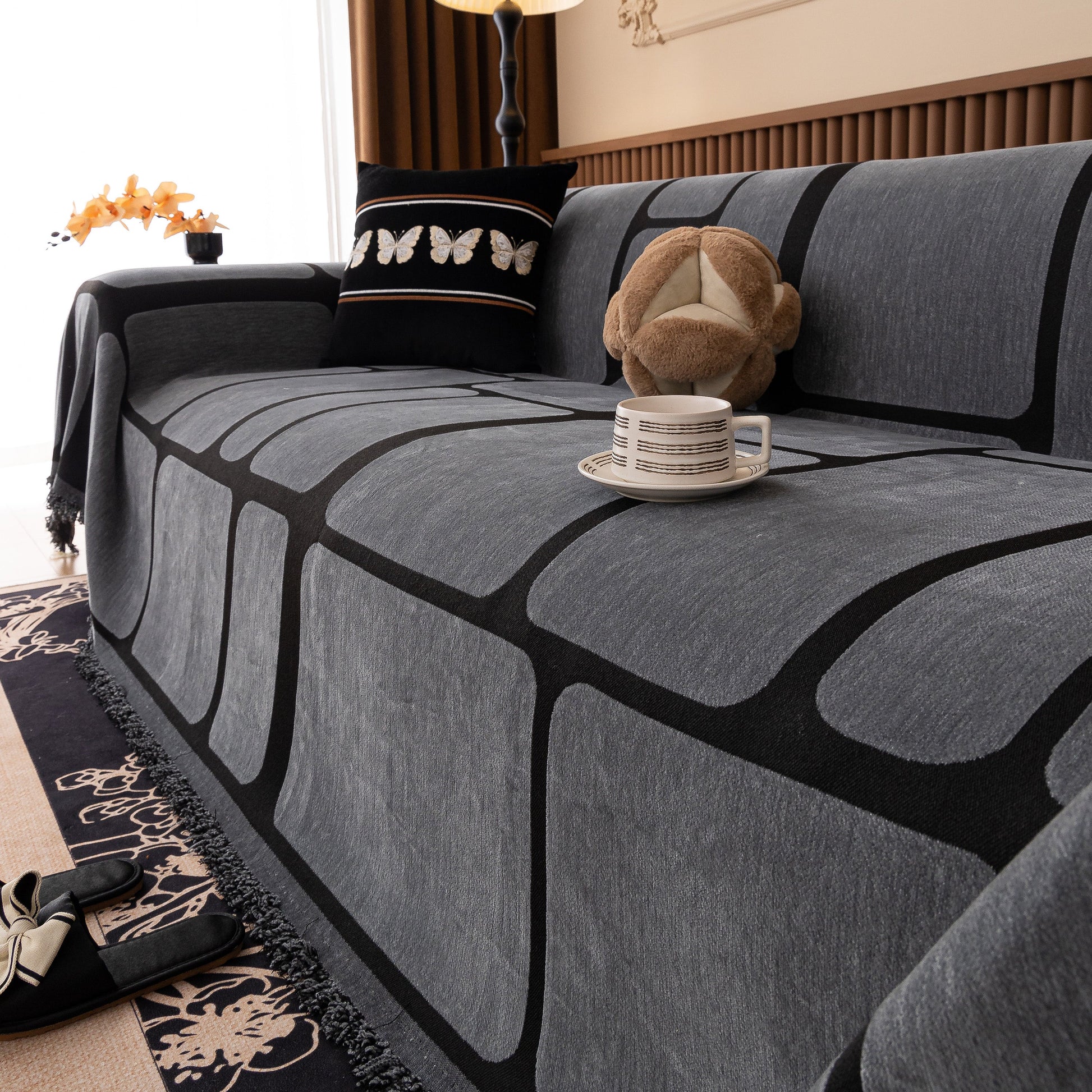 Modern Geometric Sofa Cover Decorative Couch Throw Blanket Furniture Protector in grey chenille with geometric pattern and tassels