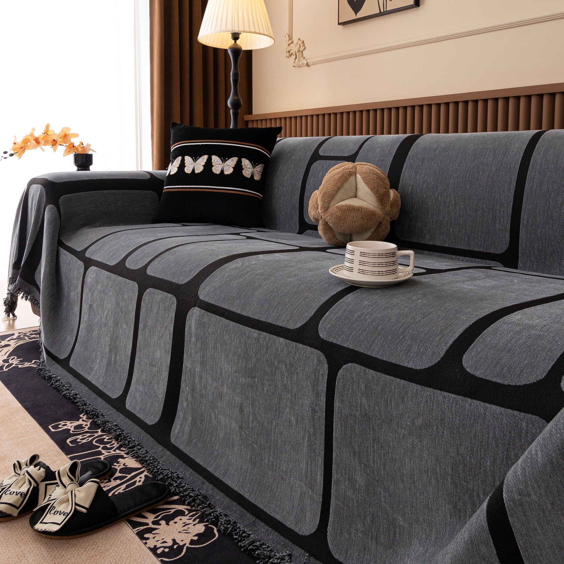 Modern Geometric Sofa Cover Decorative Couch Throw Blanket Furniture Protector in a living room setting with geometric pattern.