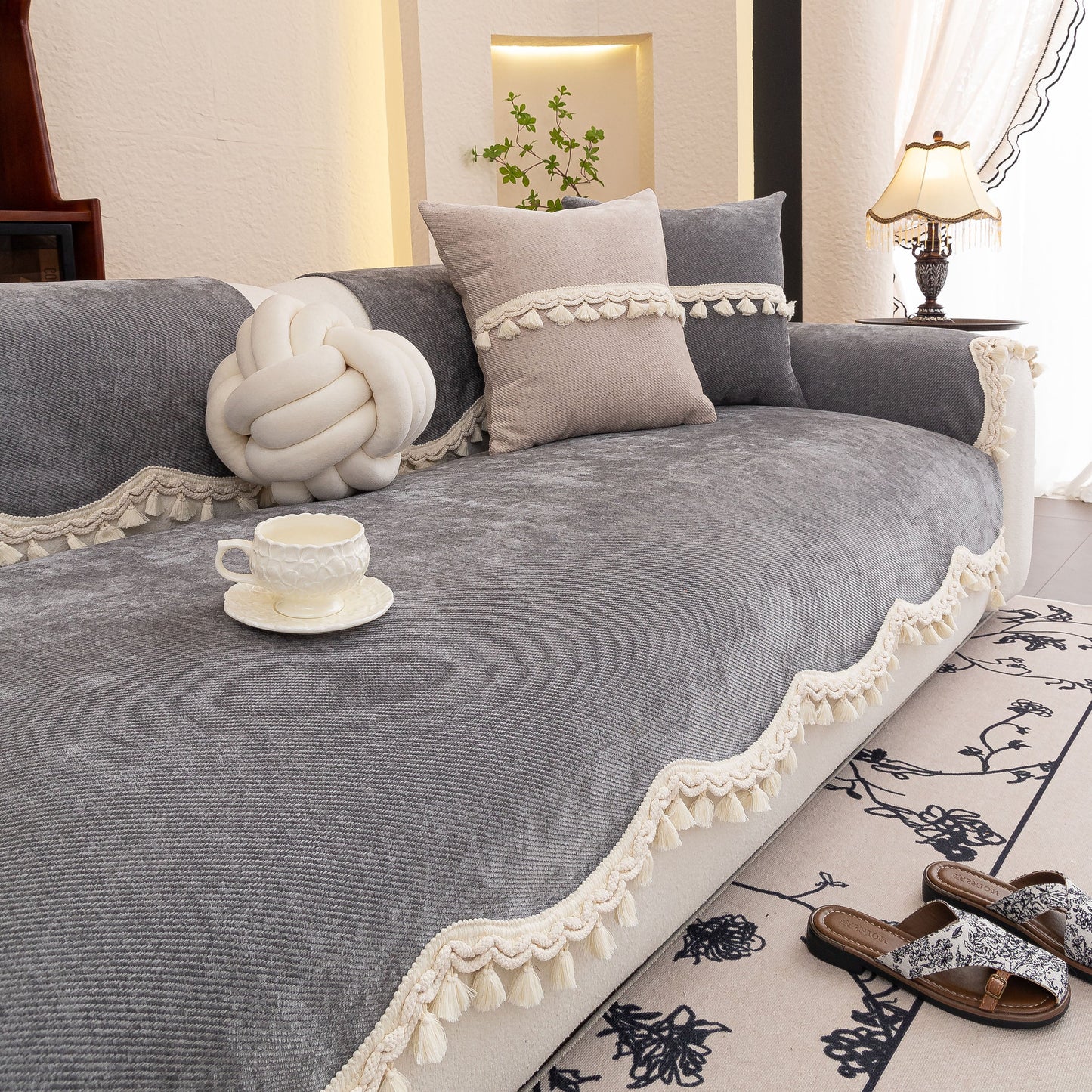 Chenille Sofa Cover Towel – Non-Slip, Washable Pets Couch Protector with Tassels in elegant living room setting.