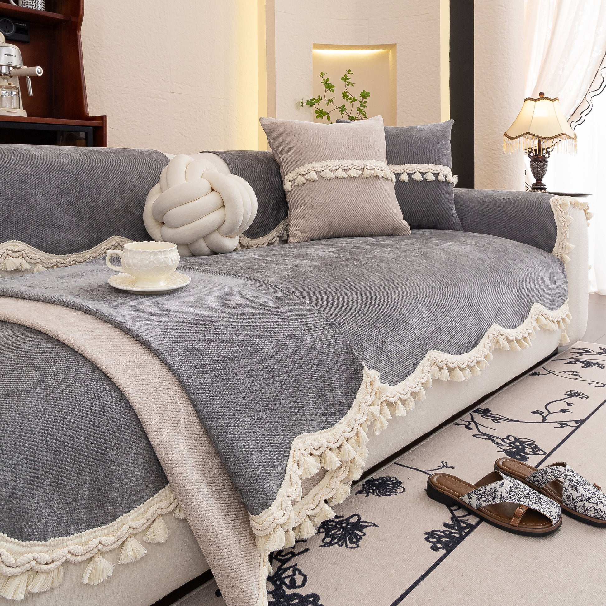 Chenille Sofa Cover Towel – Non-Slip, Washable Pets Couch Protector with Tassels in elegant living room setting.