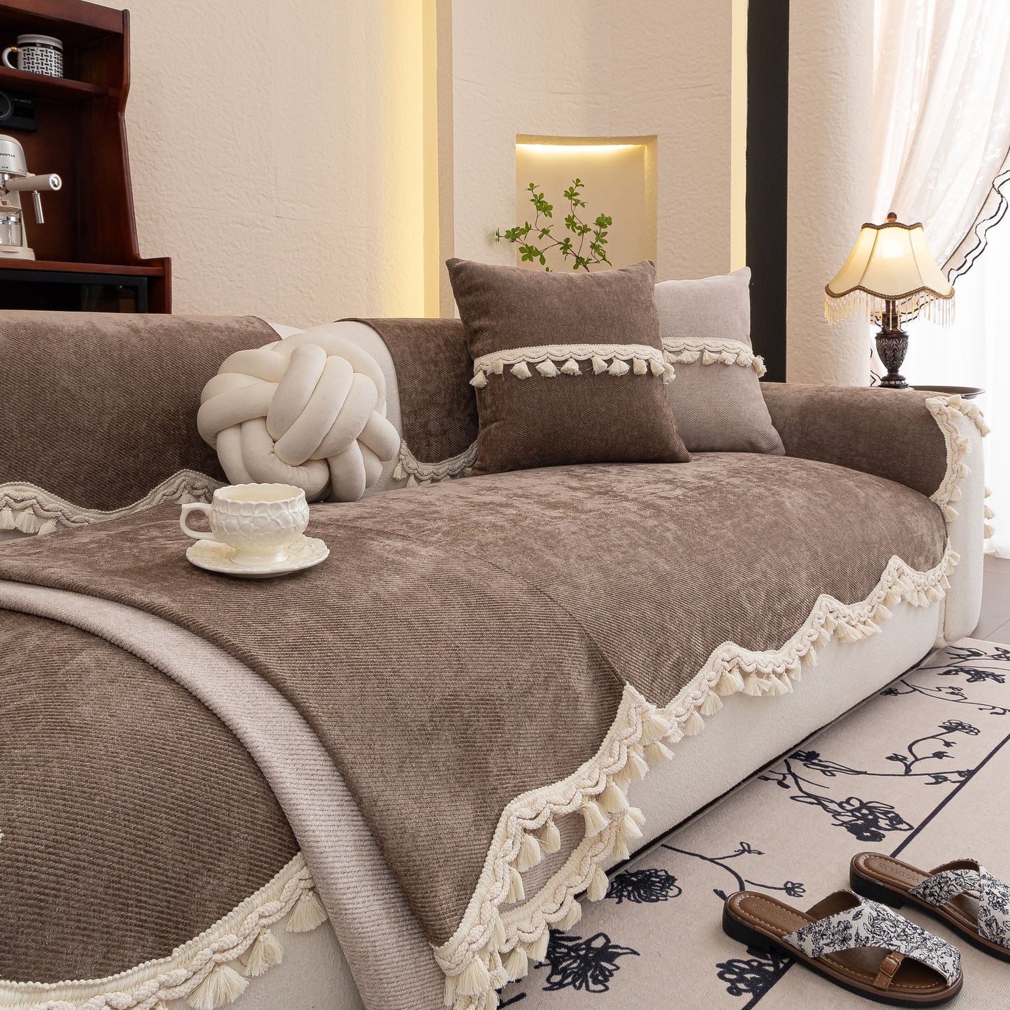 Chenille Sofa Cover Towel – Non-Slip, Washable Pets Couch Protector with Tassels on elegant beige sofa with pillows and decor.
