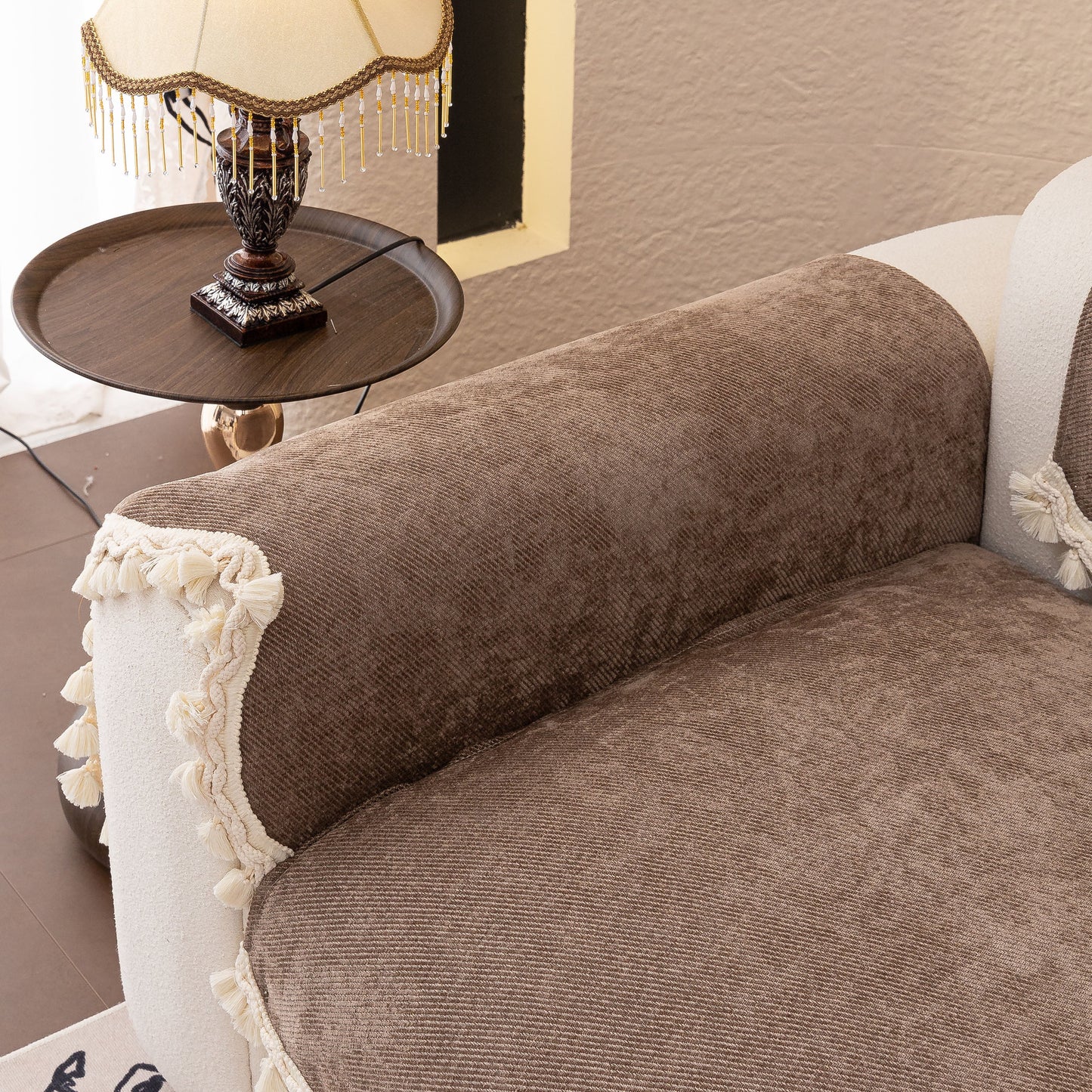 Chenille Sofa Cover Towel – Non-Slip, Washable Pets Couch Protector with Tassels on elegant couch with lamp