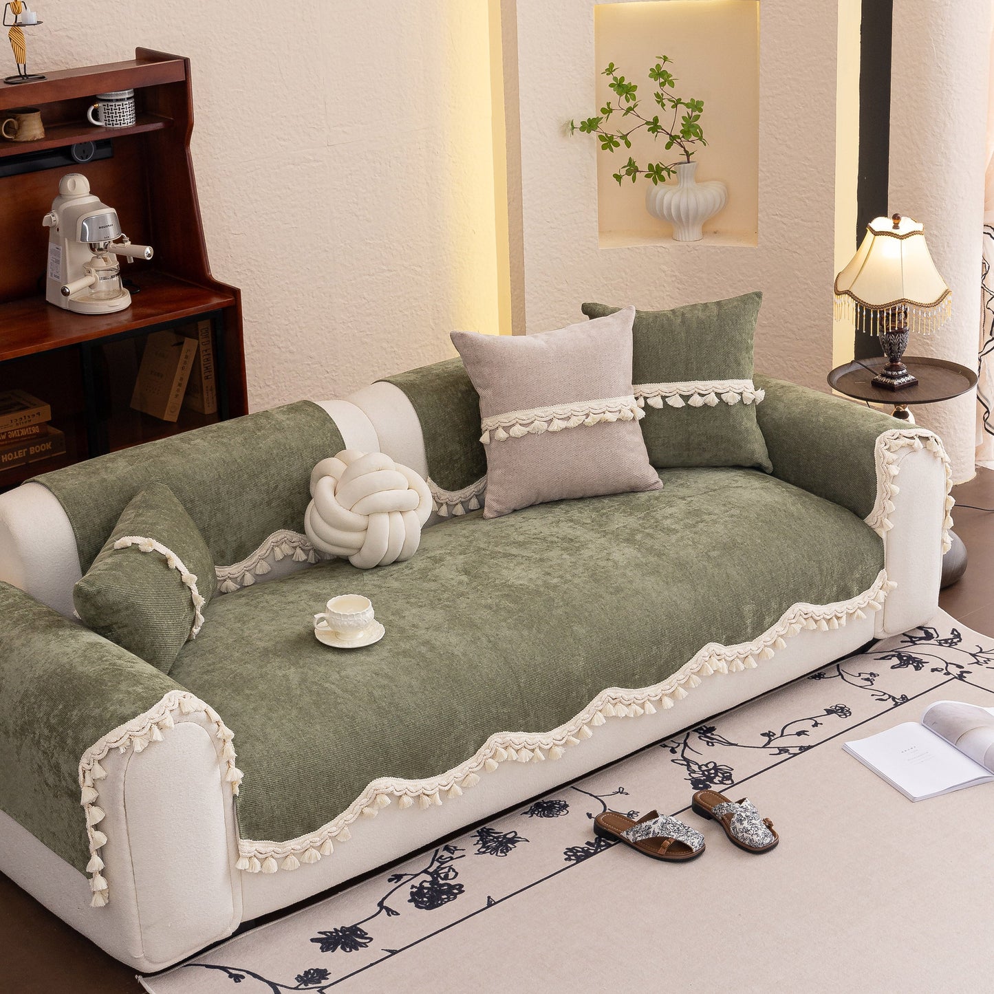 Chenille Sofa Cover Towel – Non-Slip, Washable Pets Couch Protector with Tassels on a modern sofa with decorative pillows.