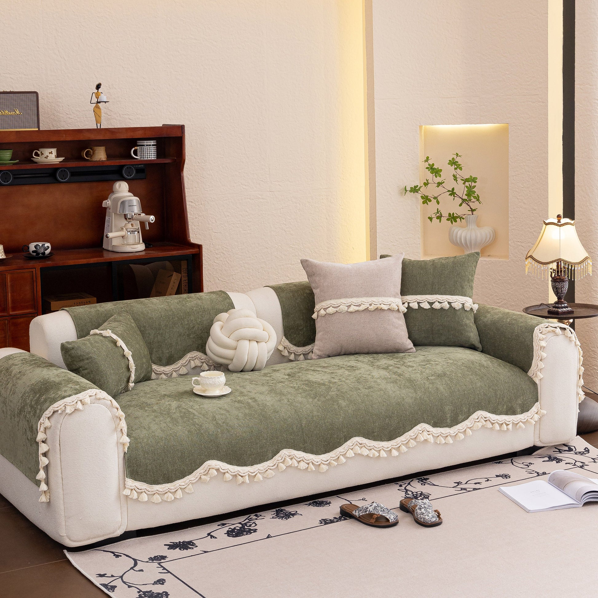 Chenille Sofa Cover Towel – Non-Slip, Washable Pets Couch Protector with Tassels on a sofa in a cozy living room.