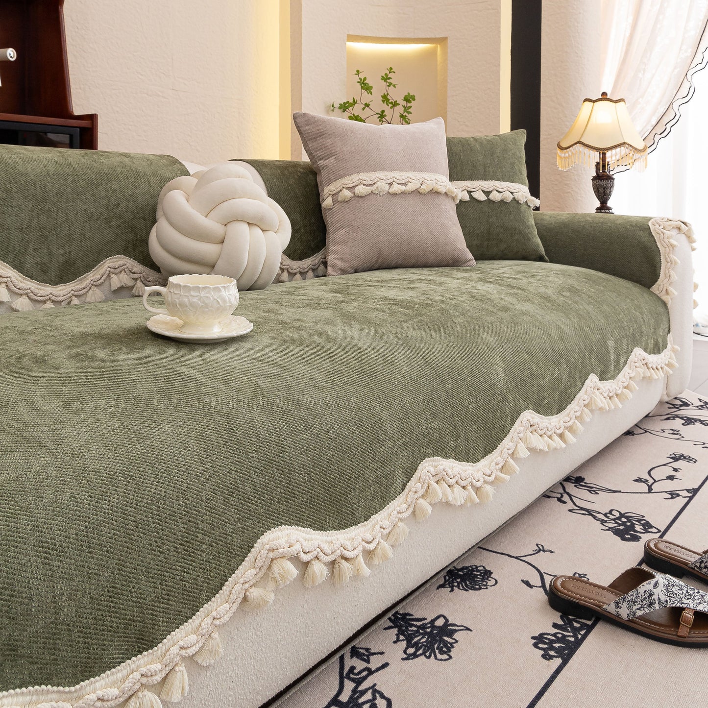 Chenille Sofa Cover Towel – Non-Slip, Washable Pets Couch Protector with Tassels in green with ivory braided trim and tassels.