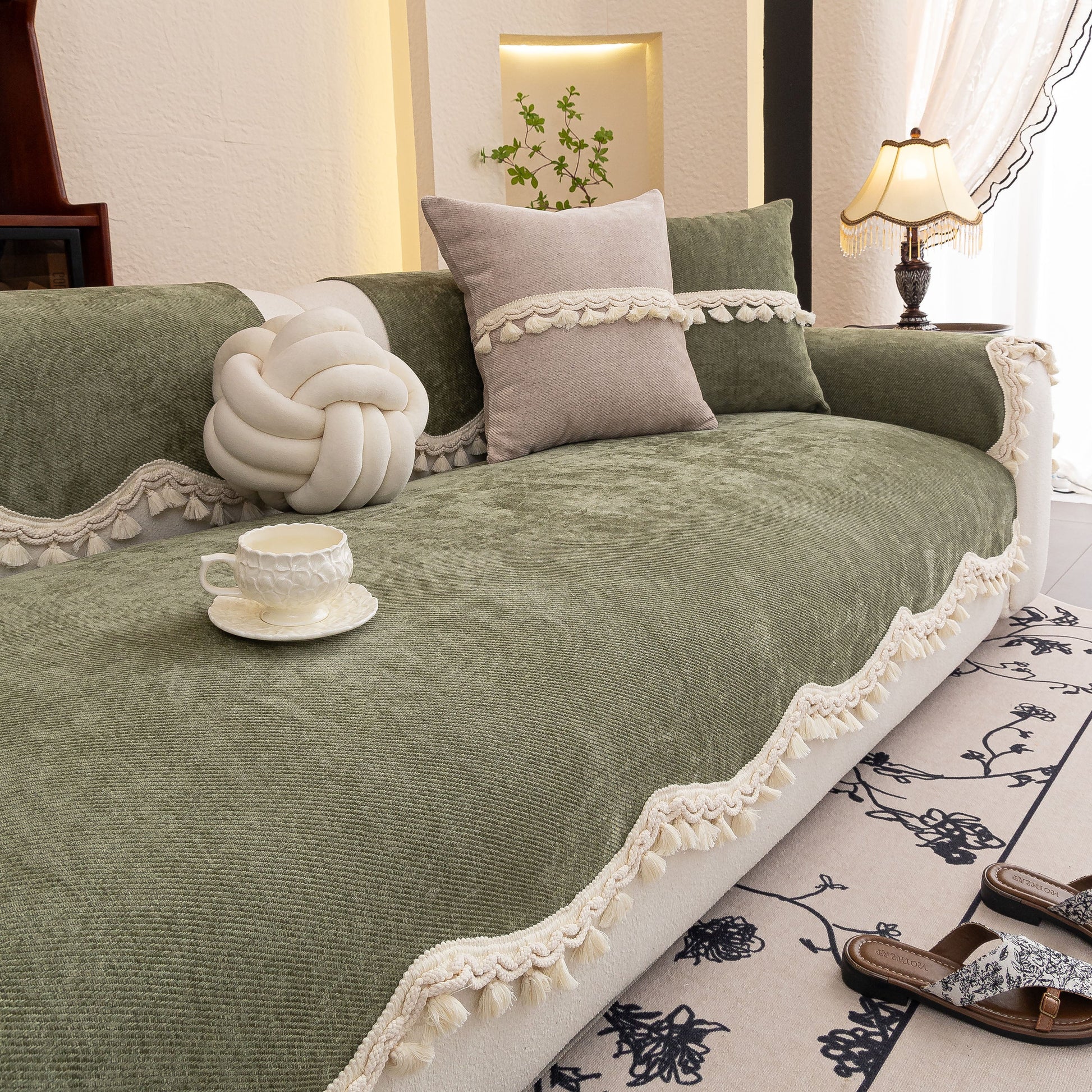 Chenille Sofa Cover Towel – Non-Slip, Washable Pets Couch Protector with Tassels on a stylish living room sofa.