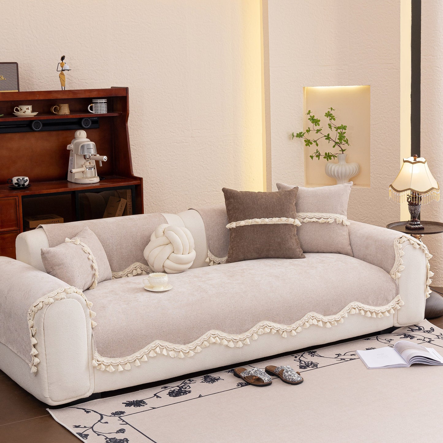 Chenille Sofa Cover Towel – Non-Slip, Washable Pets Couch Protector with Tassels on elegant beige sofa setting.