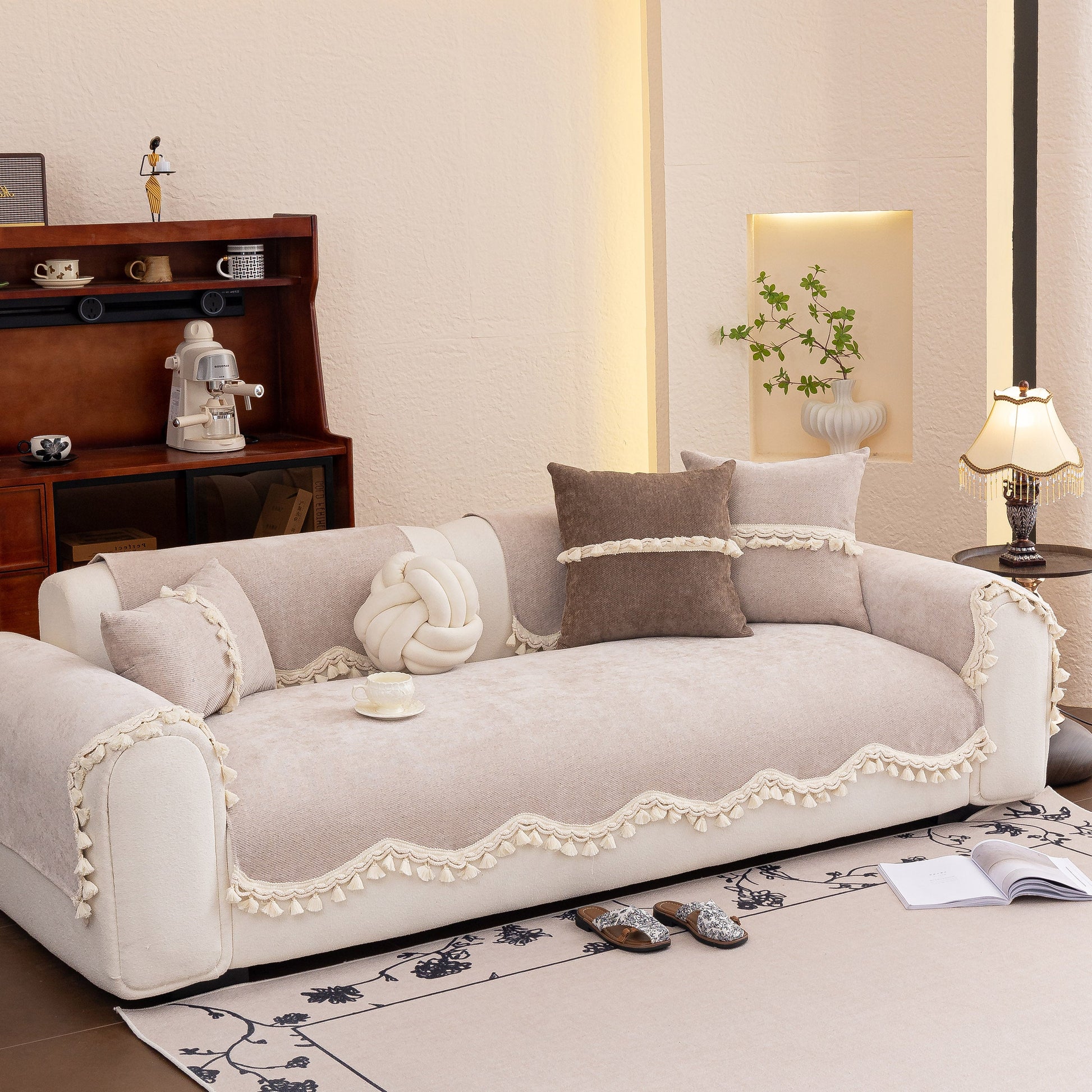 Chenille Sofa Cover Towel – Non-Slip, Washable Pets Couch Protector with Tassels on elegant beige sofa setting.