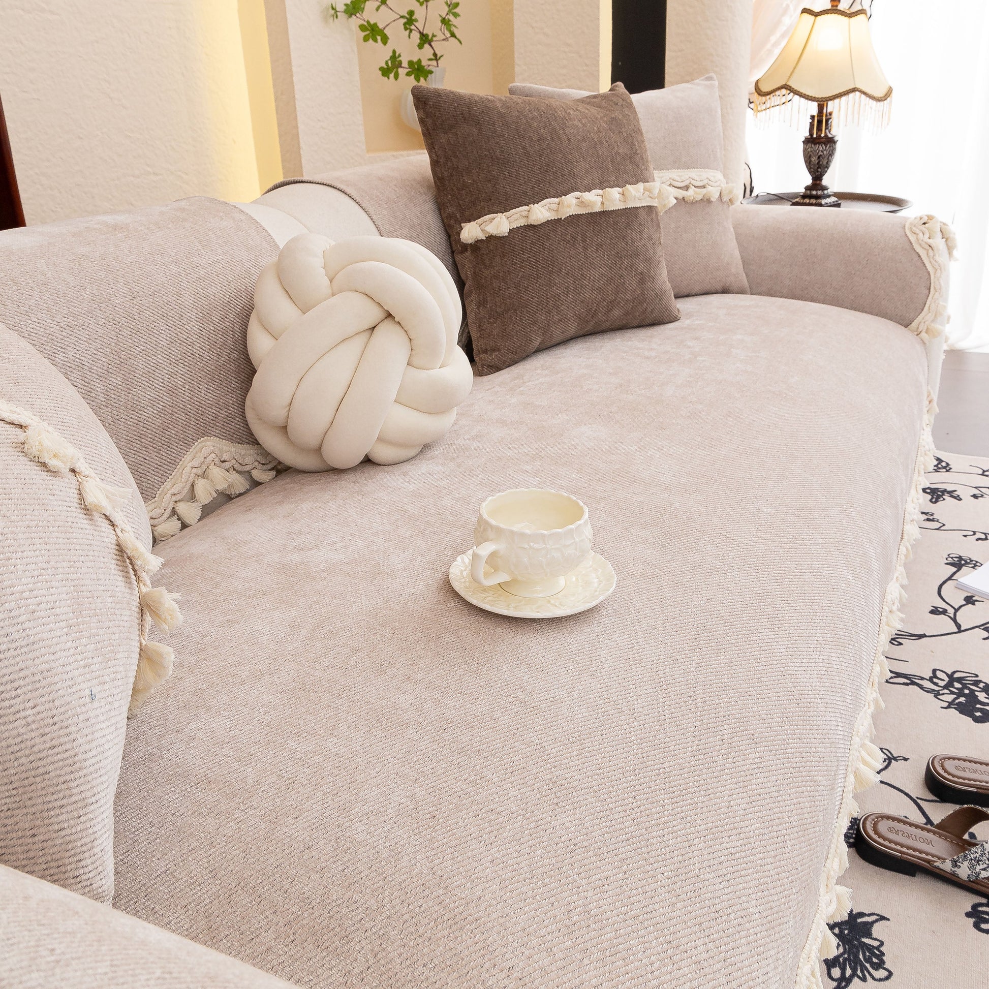 Chenille Sofa Cover Towel – Non-Slip, Washable Pets Couch Protector with Tassels on elegant sofa with decorative pillows