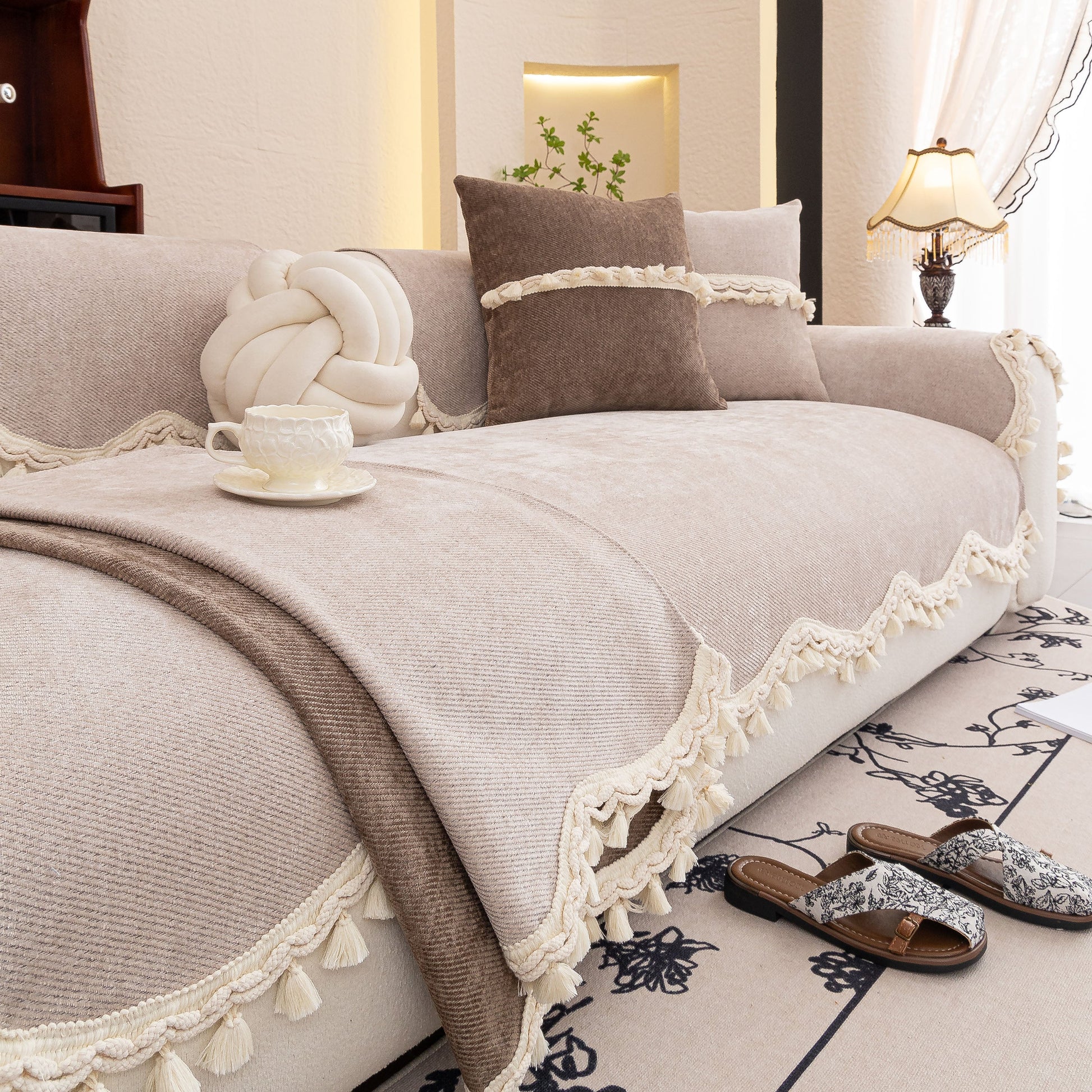 Chenille Sofa Cover Towel – Non-Slip, Washable Pets Couch Protector with Tassels in elegant living room setting.