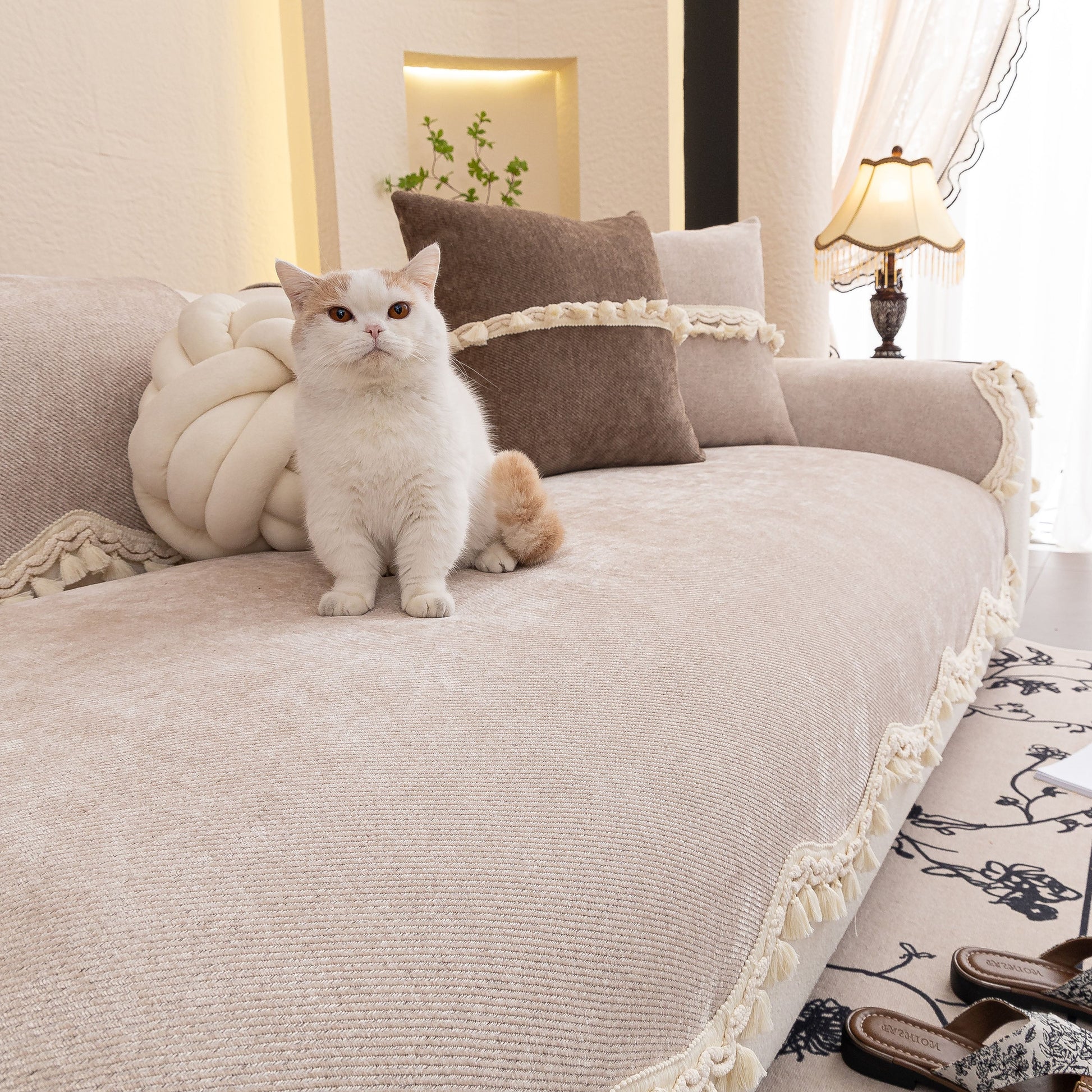 Chenille Sofa Cover Towel – Non-Slip, Washable Pets Couch Protector with Tassels featuring a cat on a sofa