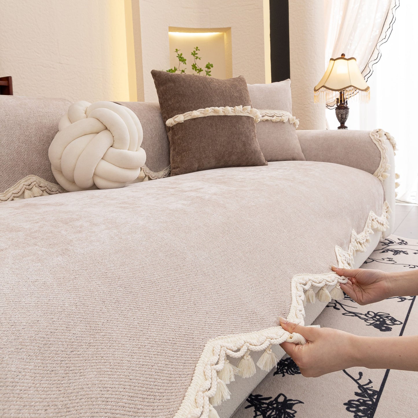 Chenille Sofa Cover Towel – Non-Slip, Washable Pets Couch Protector with Tassels on a sofa with decorative cushions.