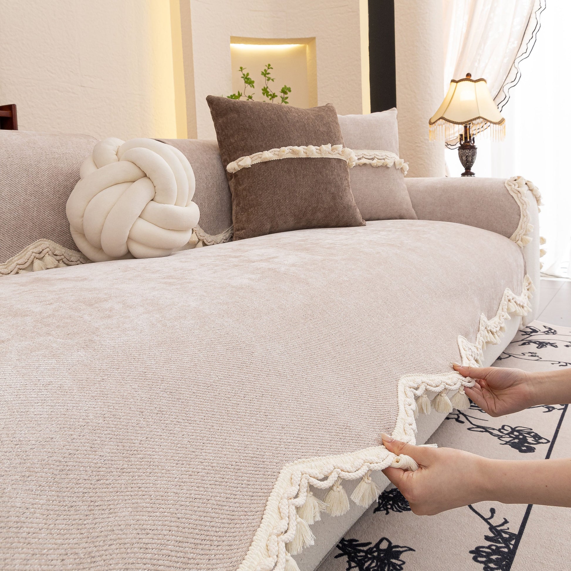 Chenille Sofa Cover Towel – Non-Slip, Washable Pets Couch Protector with Tassels on a sofa with decorative cushions.