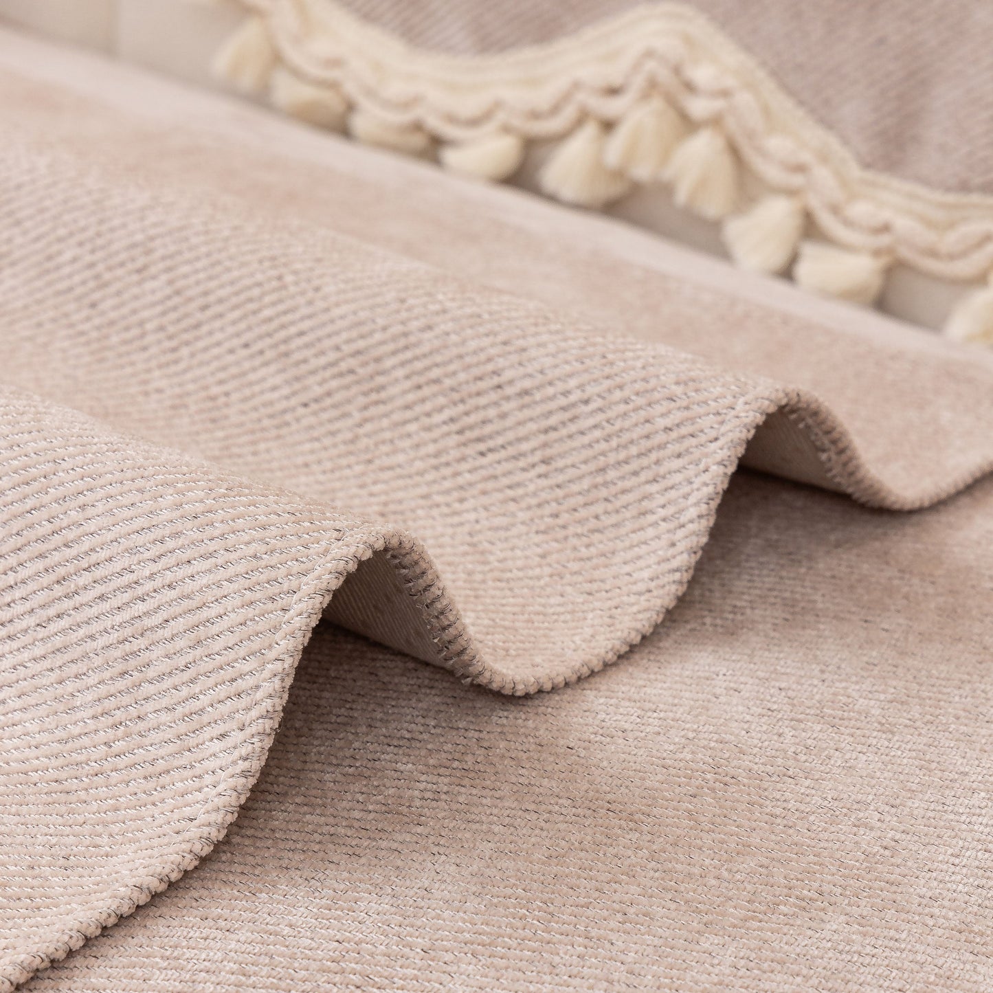 Chenille Sofa Cover Towel – Non-Slip, Washable Pets Couch Protector with Tassels displayed with ivory braided trim and tassels.