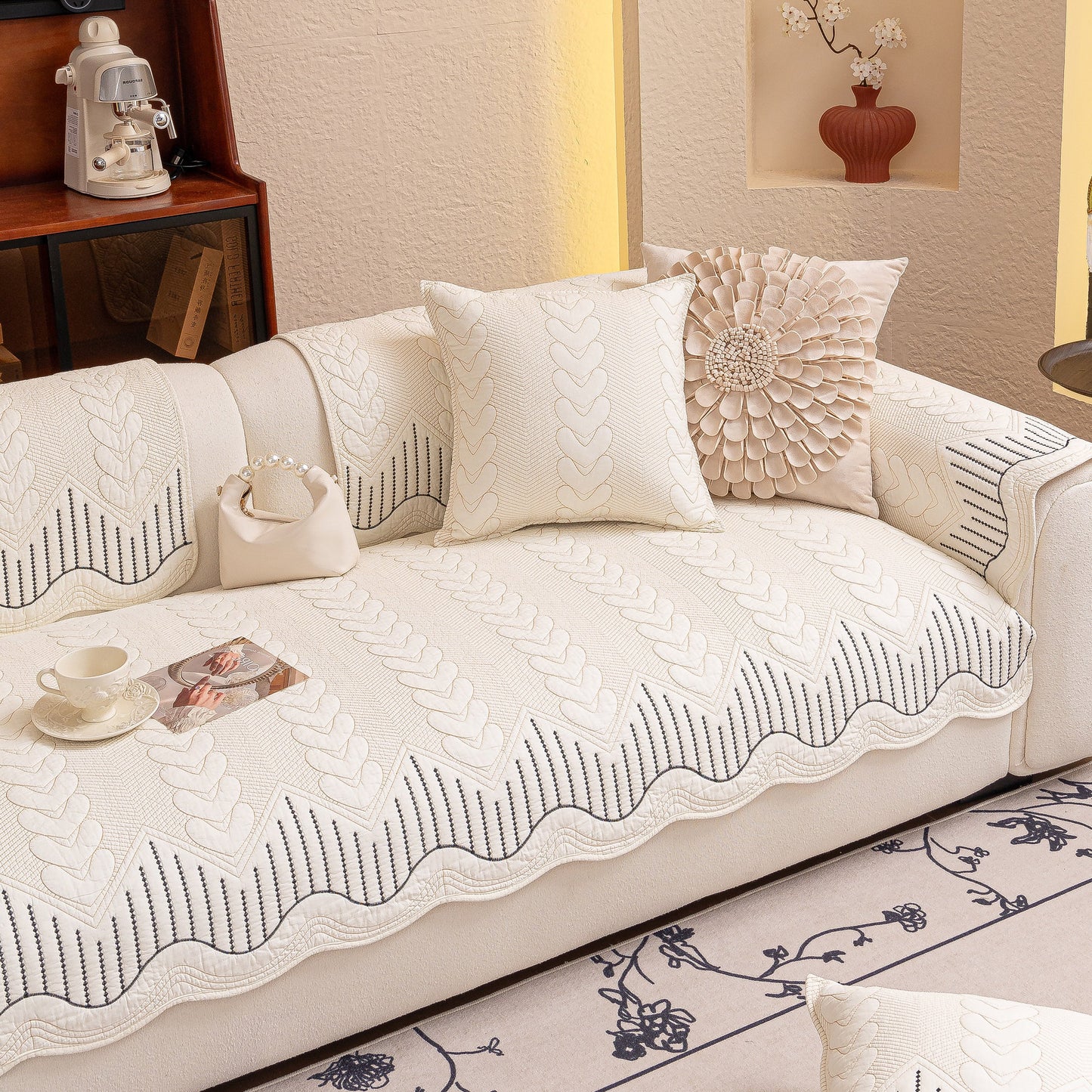 3D Quilted Thick Cotton Sofa Cover Non-Slip Couch Throw for Fabric & Leather Sofas on a white couch with decorative pillows and a teacup.