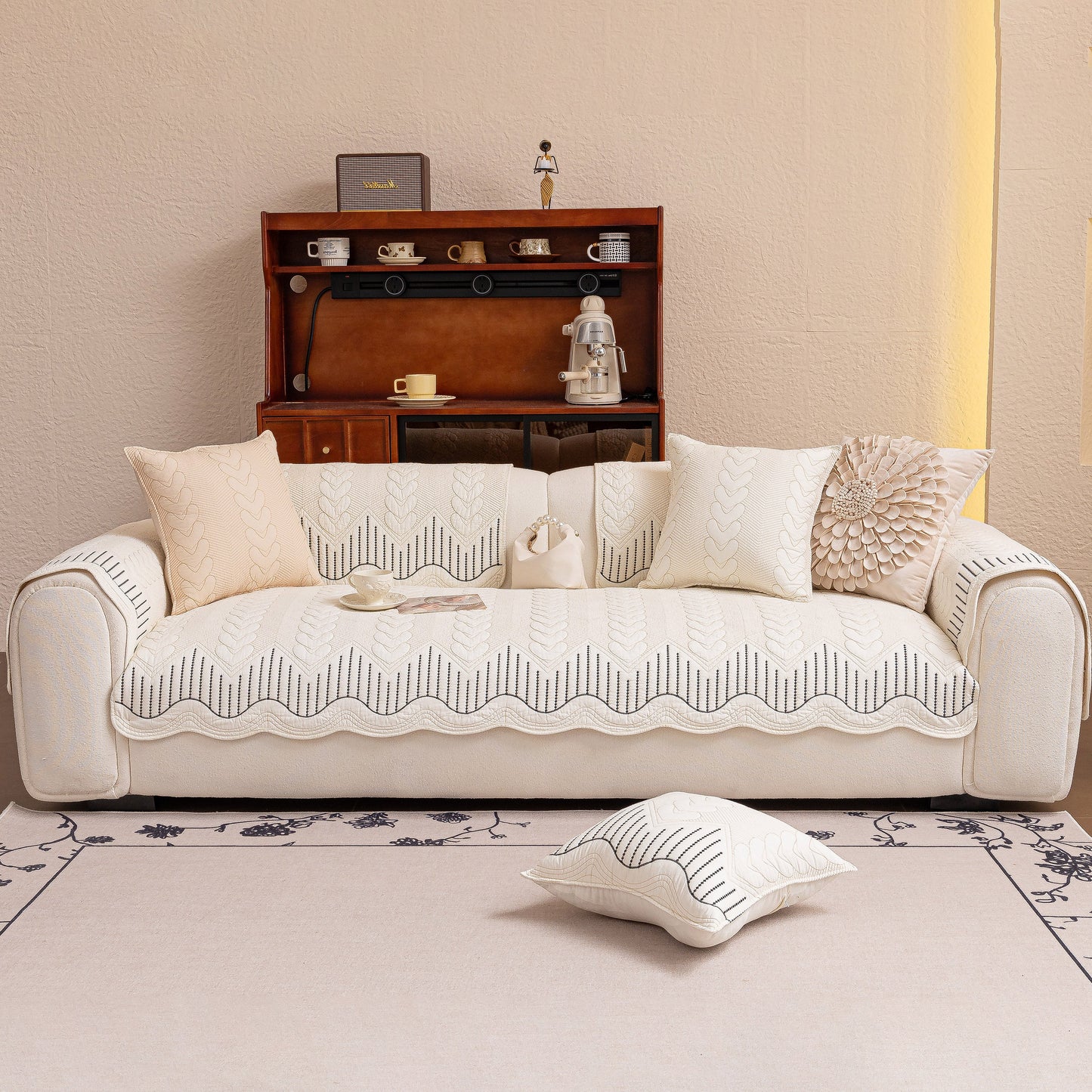 Living room with 3D Quilted Thick Cotton Sofa Cover Non-Slip Couch Throw for Fabric & Leather Sofas on a beige couch.
