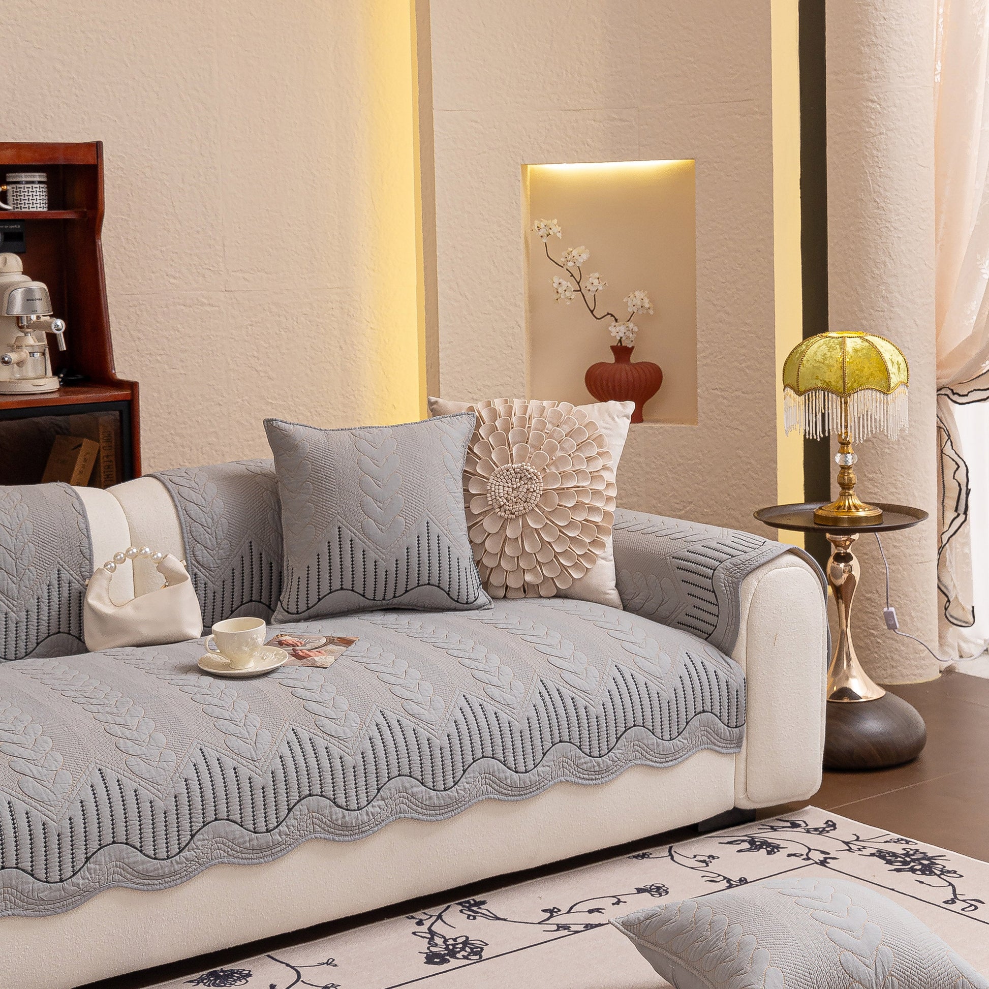 3D Quilted Thick Cotton Sofa Cover Non-Slip Couch Throw for Fabric & Leather Sofas on a white couch in a stylish living room.