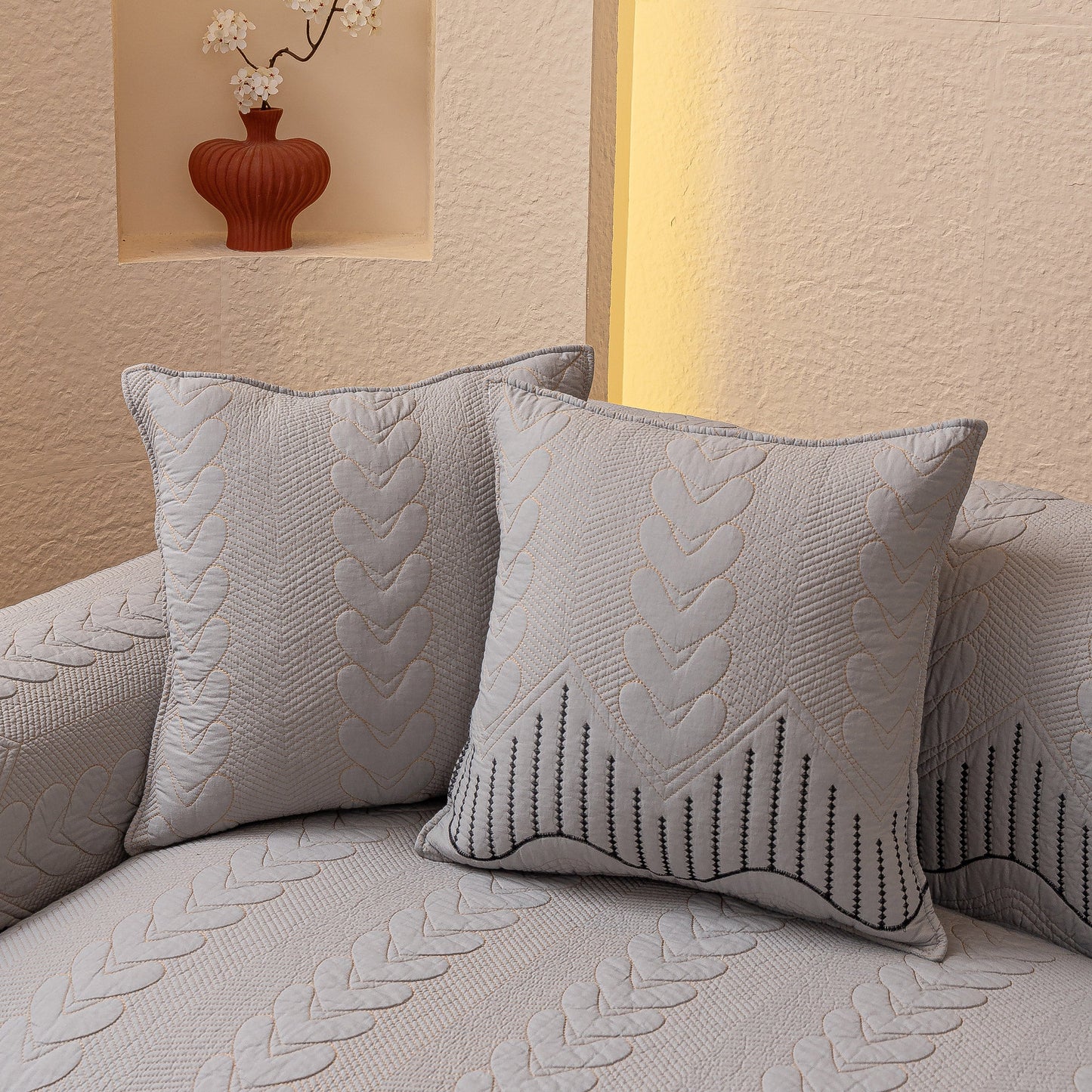 3D Quilted Thick Cotton Sofa Cover Non-Slip Couch Throw for Fabric & Leather Sofas on a couch with decorative pillows