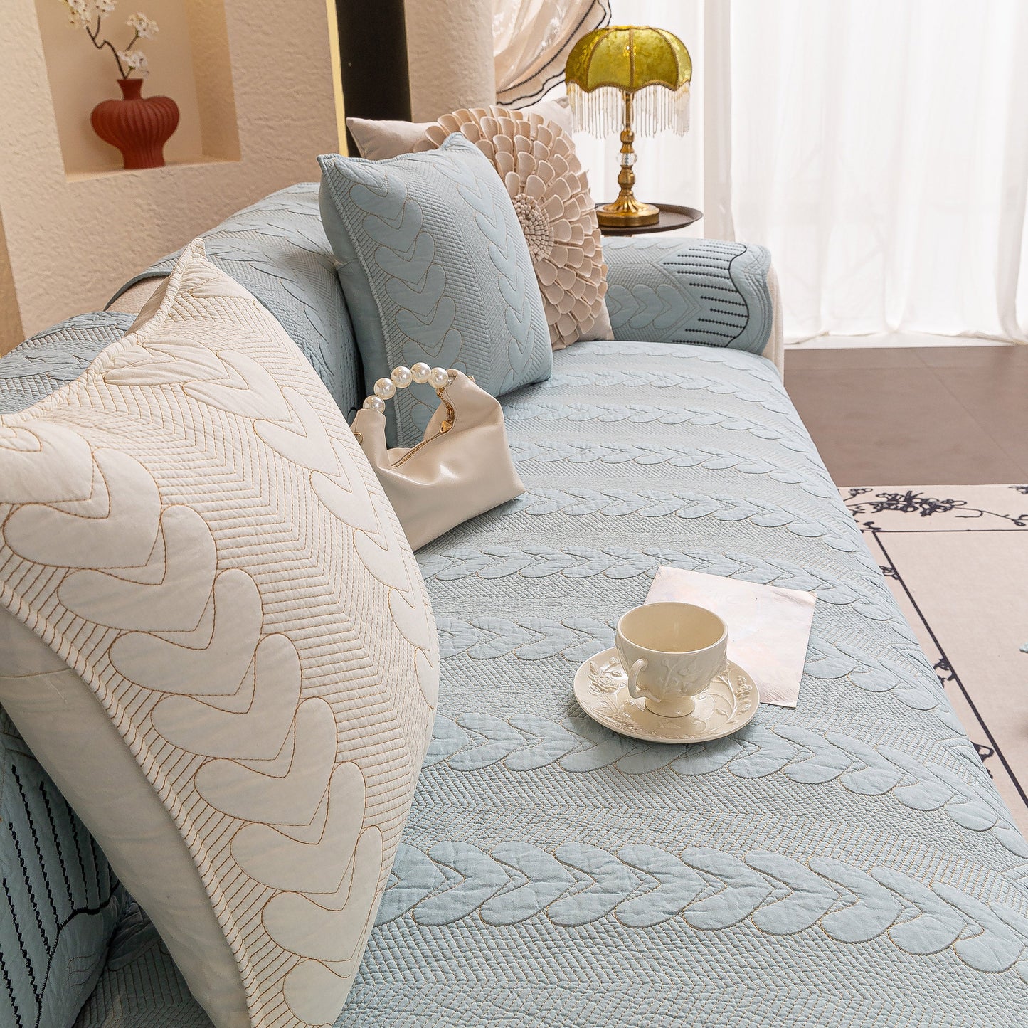 3D Quilted Thick Cotton Sofa Cover Non-Slip Couch Throw for Fabric & Leather Sofas on a stylish living room couch.