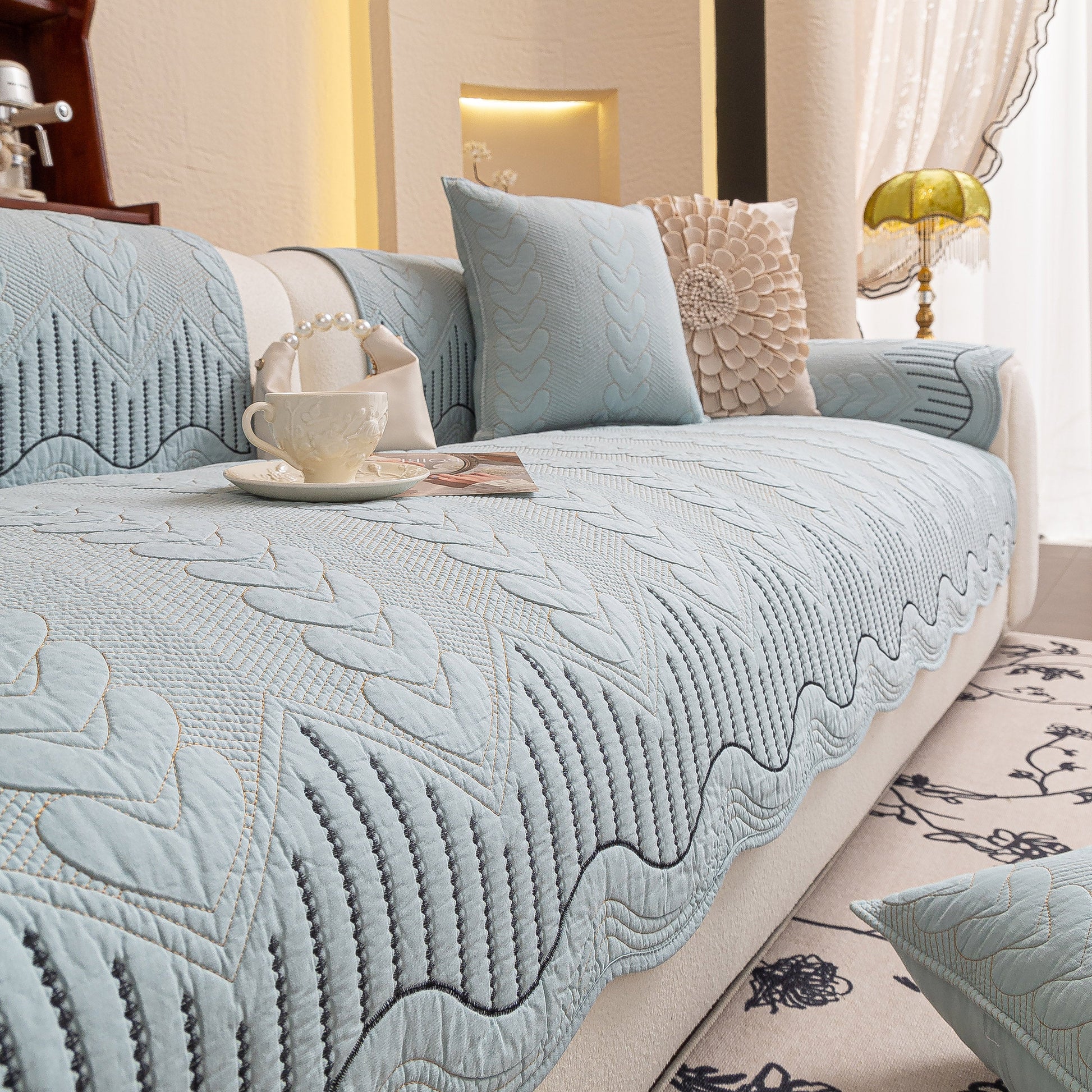 3D Quilted Thick Cotton Sofa Cover Non-Slip Couch Throw for Fabric & Leather Sofas in blue displayed on a sofa with cushions