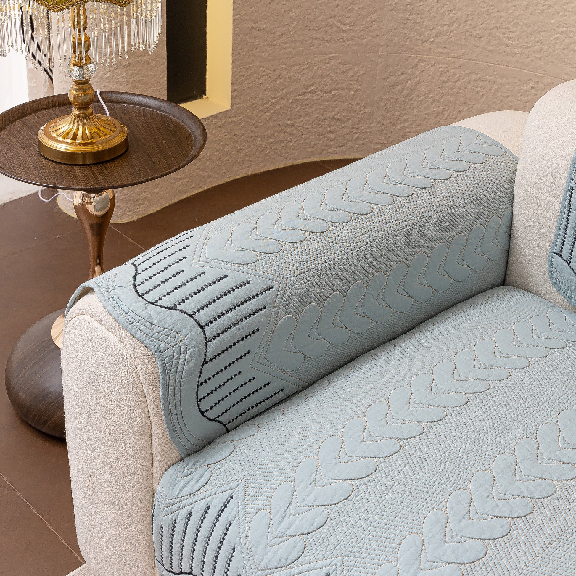 3D Quilted Thick Cotton Sofa Cover Non-Slip Couch Throw for Fabric & Leather Sofas in light blue with intricate stitching