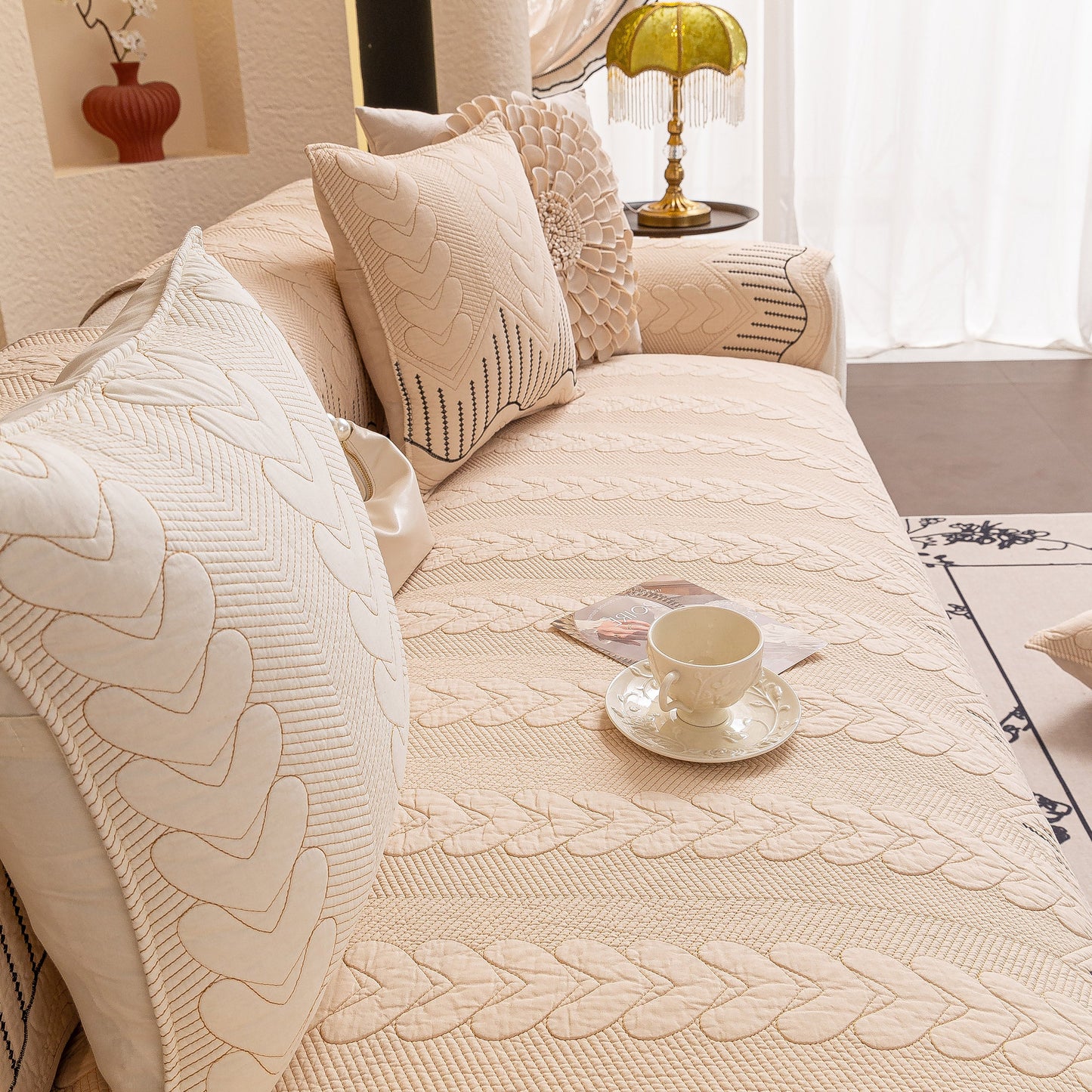 3D Quilted Thick Cotton Sofa Cover Non-Slip Couch Throw for Fabric & Leather Sofas on beige couch with pillows and teacup