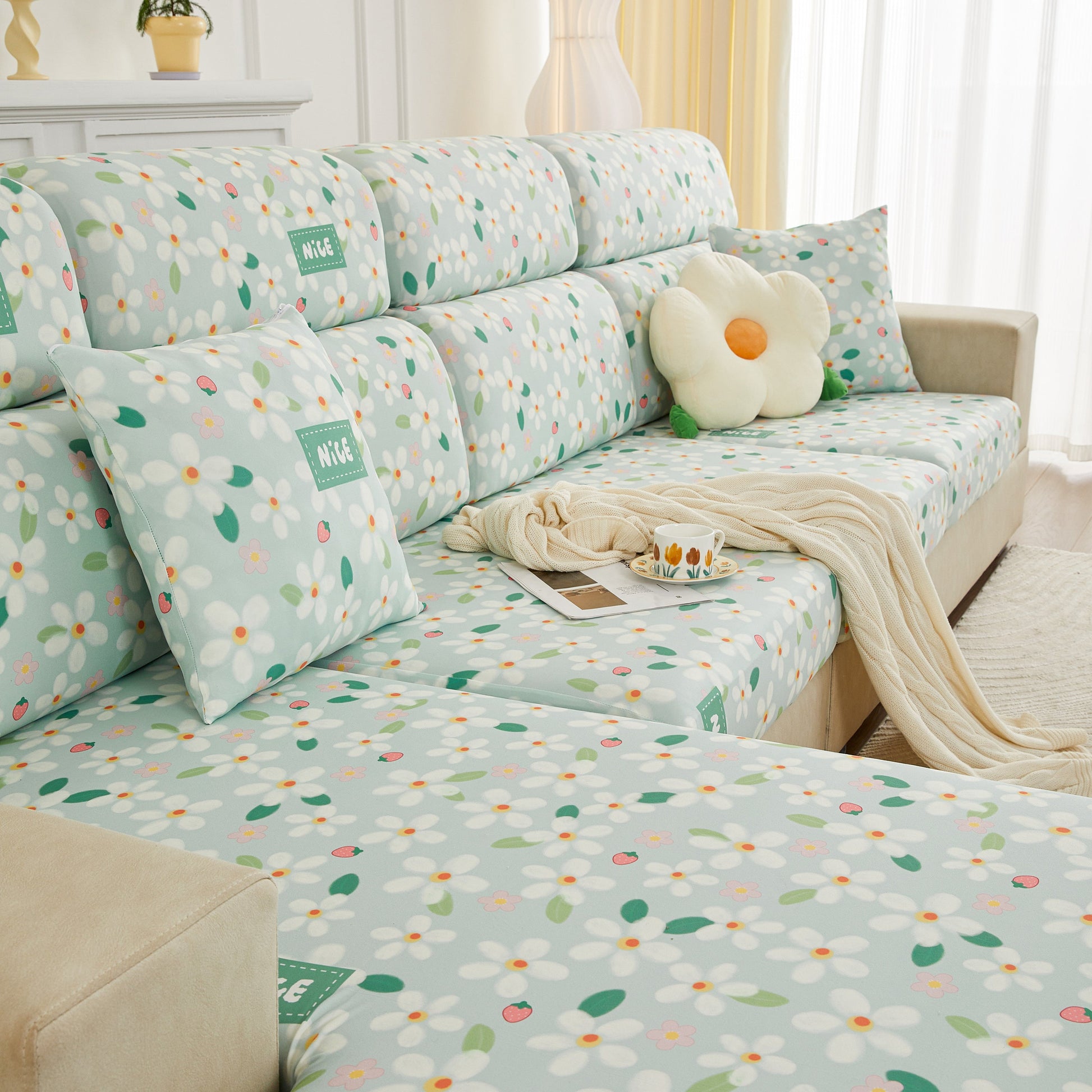 Stylish sofa with floral stretch individual cushion slipcovers, furniture protector with elastic bottom, couch cover replacement.