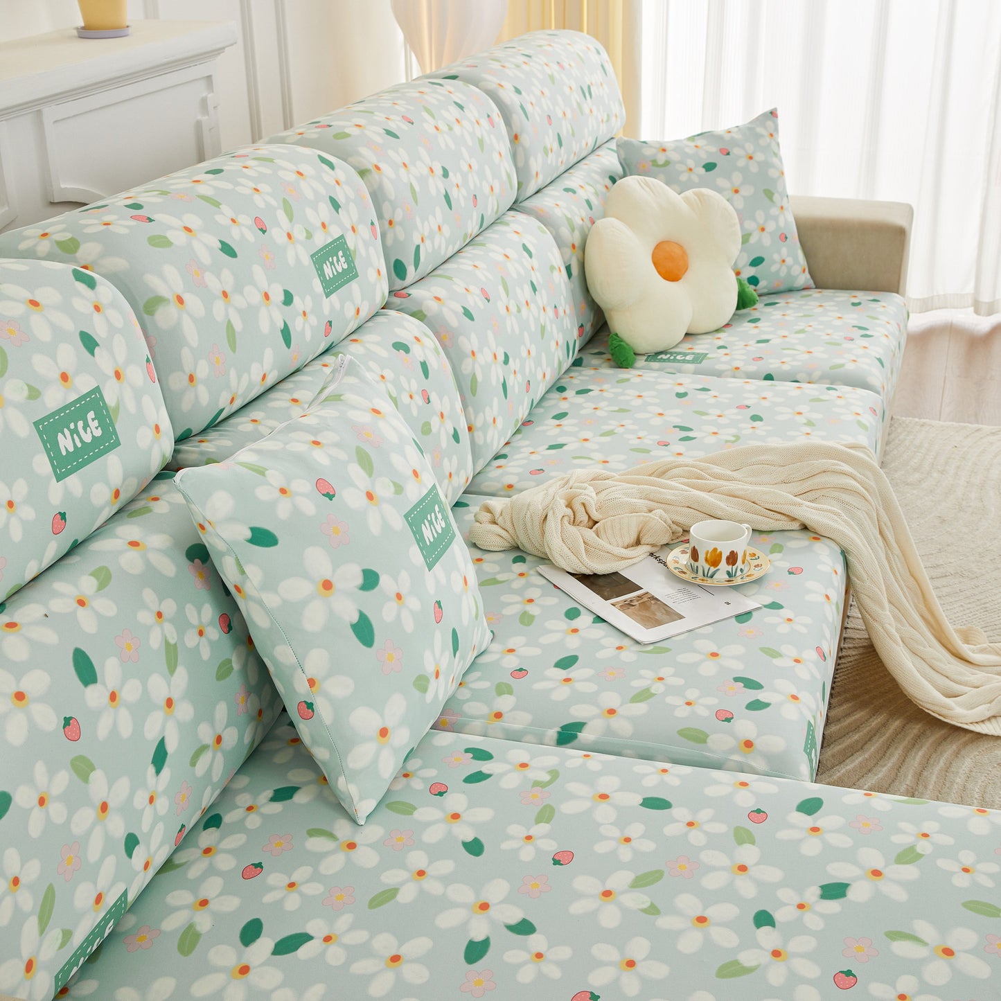 Floral-patterned couch with Stretch Individual Cushion Slipcovers, Furniture Protector with Elastic Bottom, colorful flower design.