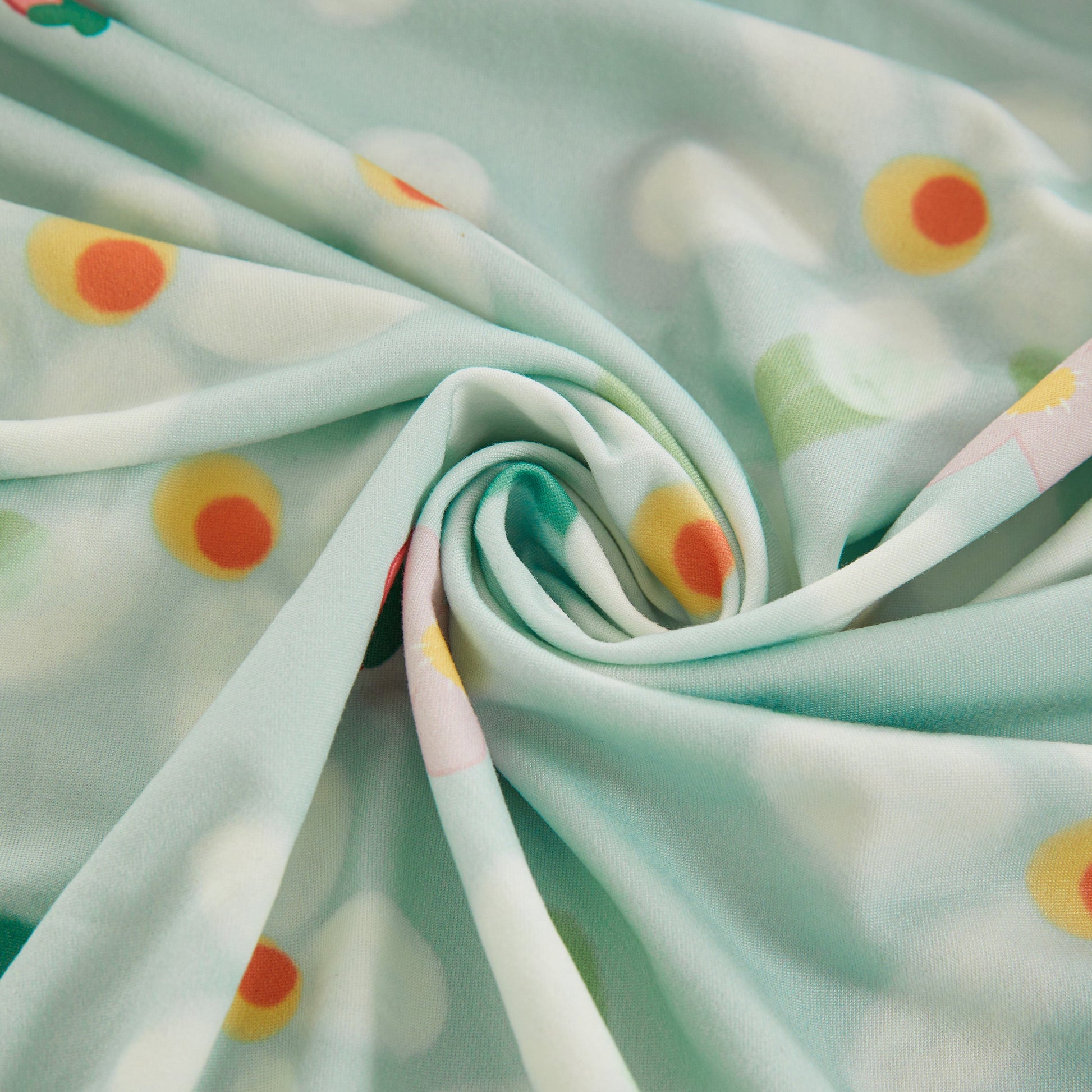 Stretch Individual Cushion Slipcovers with elastic bottom and colorful design, couch cover replacement fabric close-up.