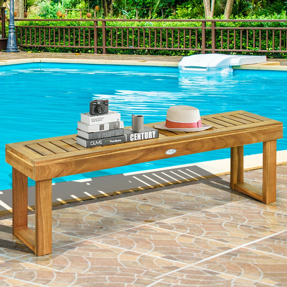 52 Inch Acacia Wood Dining Bench with Slatted Seat by a pool, features solid acacia wood for durability and is scratch resistant.