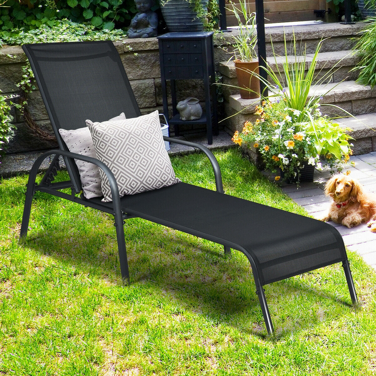 Adjustable Patio Chaise Folding Lounge Chair with Backrest-Black in garden setting, showcasing sturdy support and breathable fabric