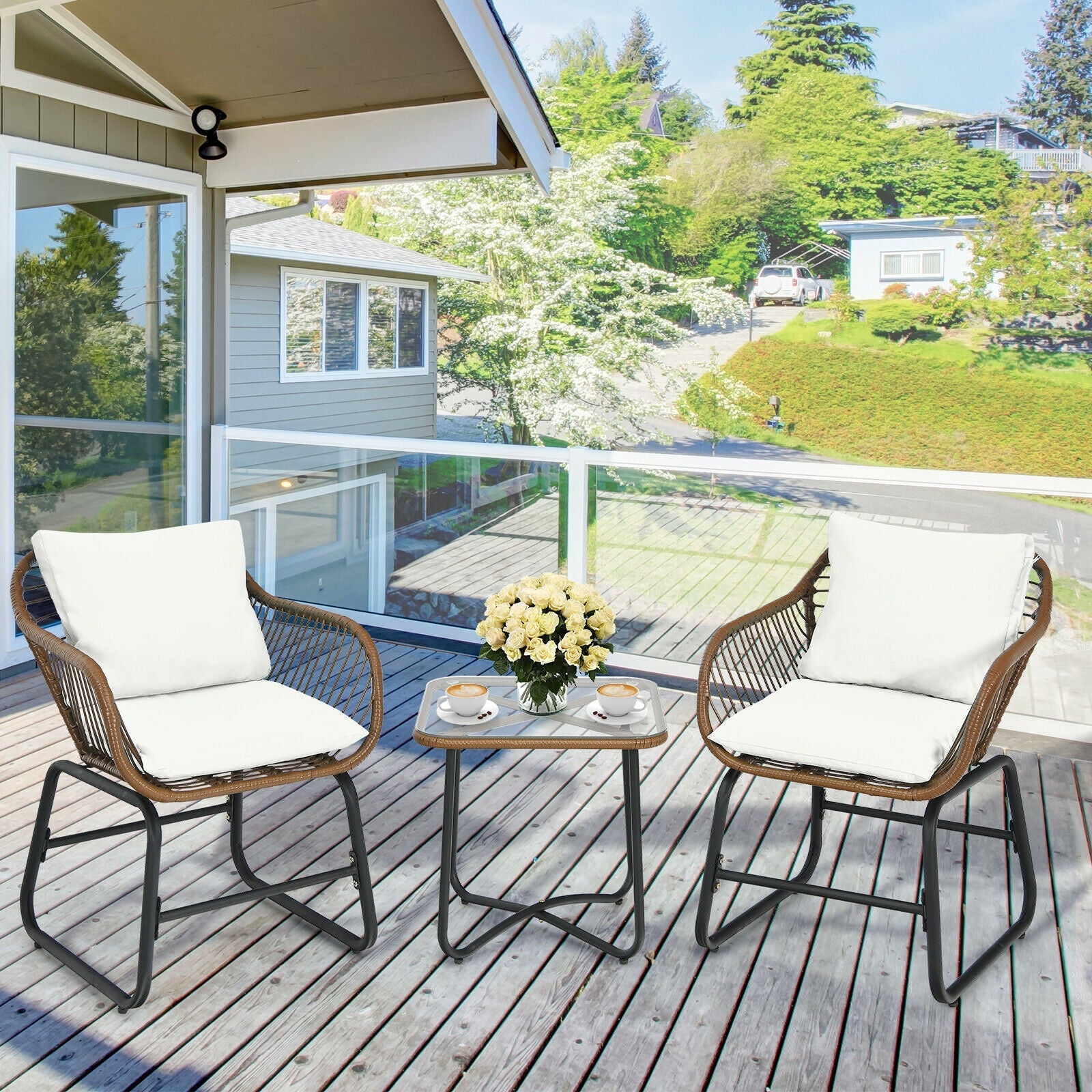 3 Pieces Patio Rattan Bistro Set Cushioned Chair Glass Table Deck-White on a sunny porch with flowers