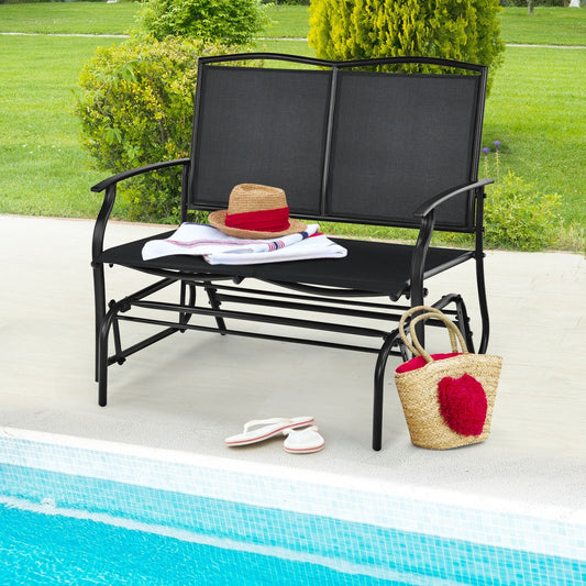 Iron Patio Rocking Chair for Outdoor Backyard and Lawn-Black beside a pool with accessories