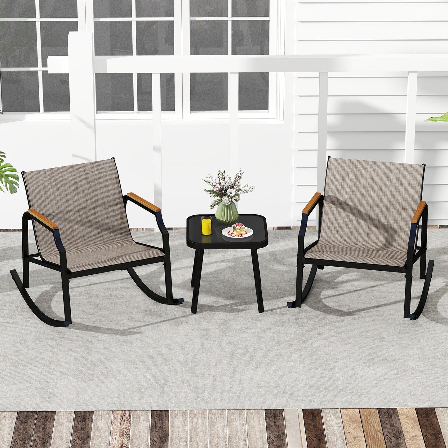 3 Piece Patio Rocking Bistro Set with Tempered Glass Coffee Table and Armrests for Porch-Brown, featuring ergonomic chairs and table.