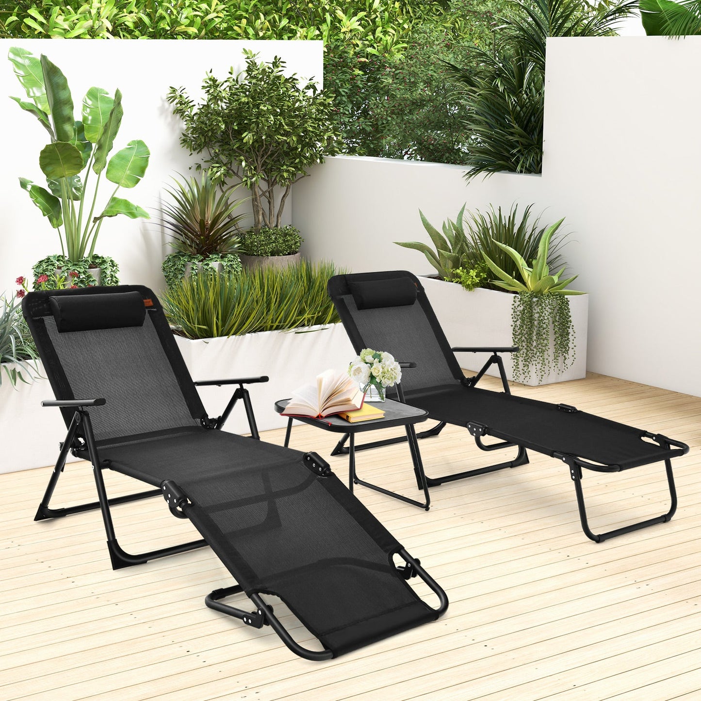 3 Pieces Patio Folding Chaise Lounge Set with PVC Tabletop-Black on a stylish outdoor deck