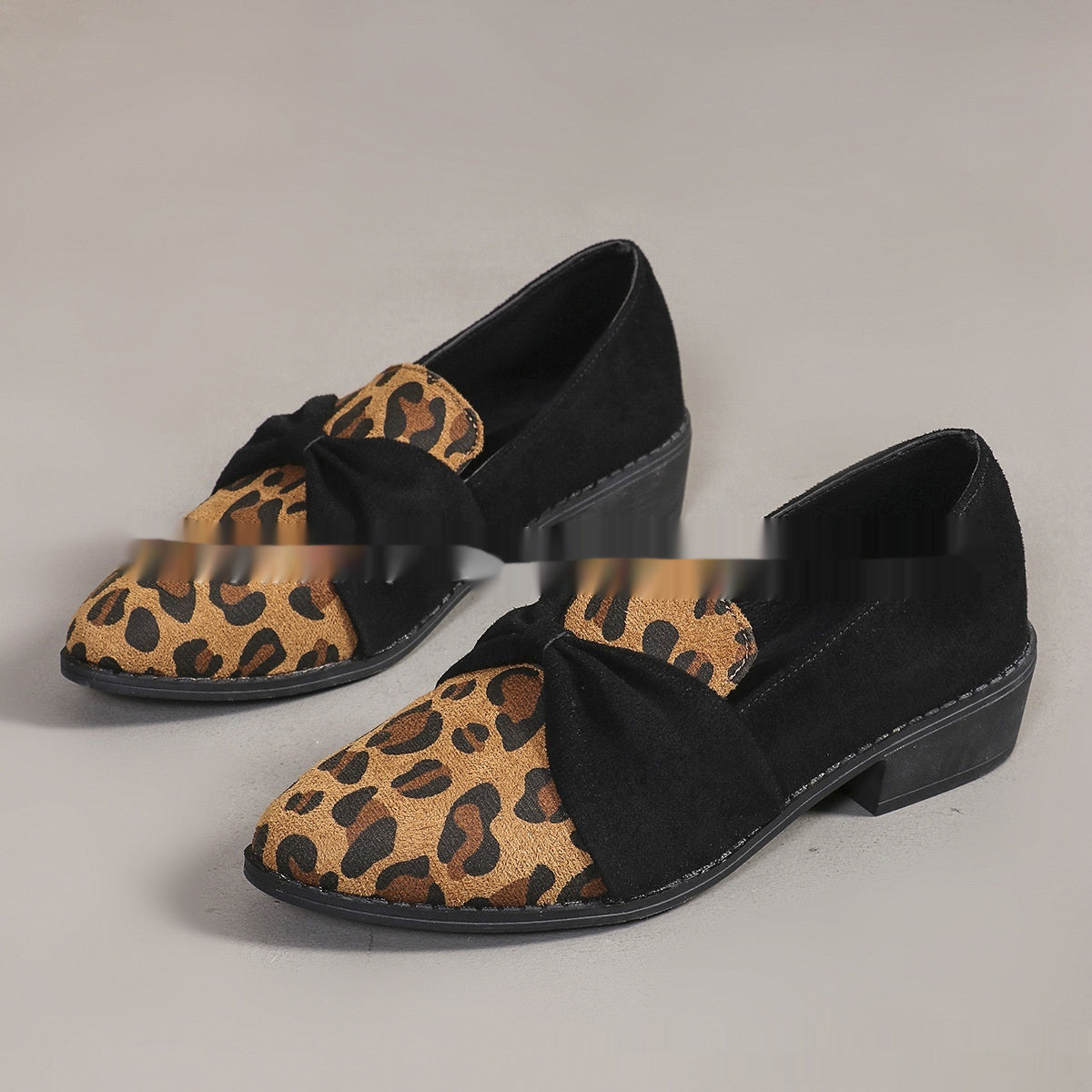 Women’s Leopard Print Pumps with bow accent, casual stylish footwear, bold fashion statement piece for versatile wear