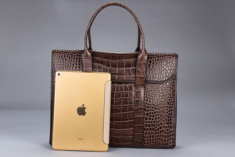 Exotic Croco Leather Laptop Bag - Luxury Genuine Cowhide for Stylish Women displayed with a tablet for size comparison