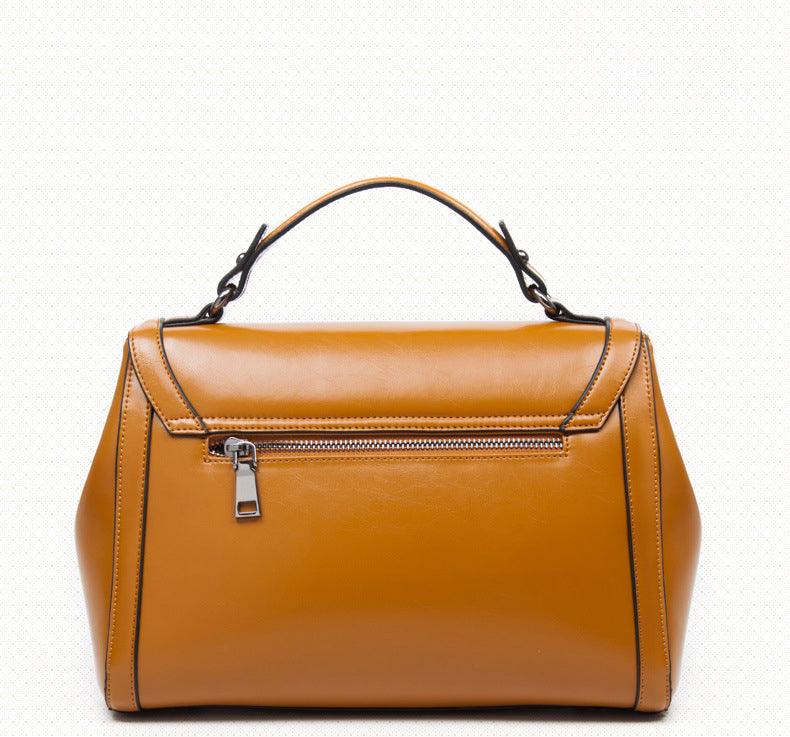Luxury Genuine Leather Fashion Handbag for Cowgirls - Premium Black & Retro Brown, showcasing classic style and craftsmanship.