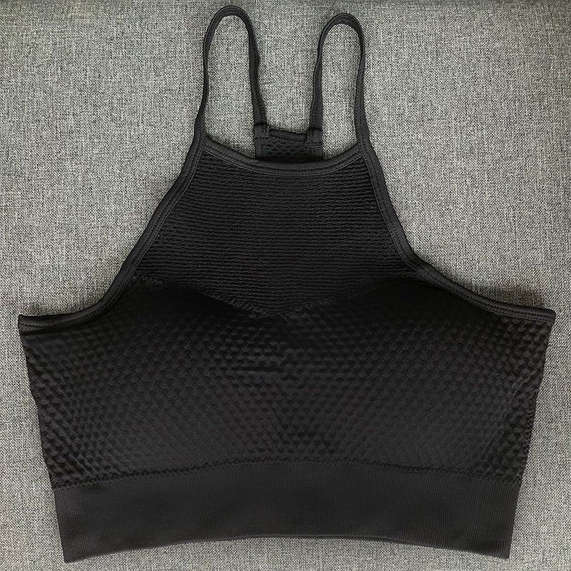 Freedom Cross Back Sport Bra with breathable mesh and support straps, ideal for active lifestyle and fitness activities.