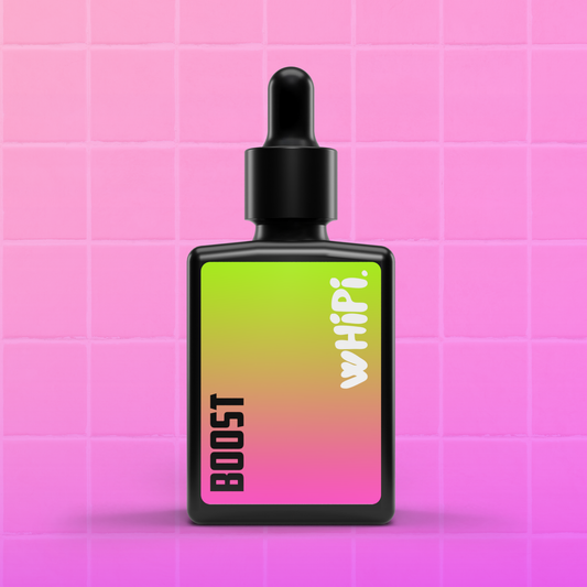 Boost- Crown Whip Scalp Tonic bottle against pink tiled background
