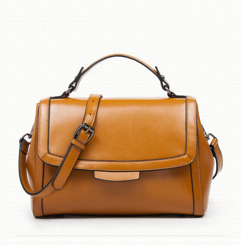 Luxury Genuine Leather Fashion Handbag for Cowgirls - Premium Black & Retro Brown on display