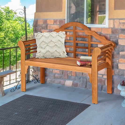 49 Inch Eucalyptus Wood Outdoor Folding Bench with Backrest Armrest for Patio Garden on a porch with pillow and book