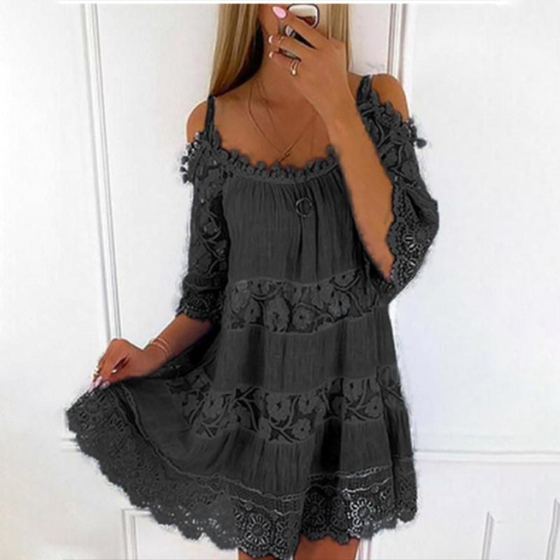 Woman wearing Lace Embrace Summer Sling Dress with lace and flying sleeves.