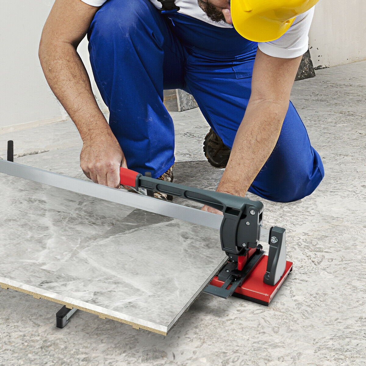 Worker using 48 Inch Manual Tile Cutter Porcelain Cutter Machine for precise tile cutting on site, showcasing adjustable angle and ergonomic design.