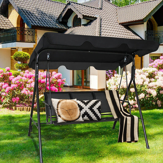 3 Person Patio Swing with Polyester Angle Adjustable Canopy in garden setting, featuring weather-resistant steel frame and comfortable seating.