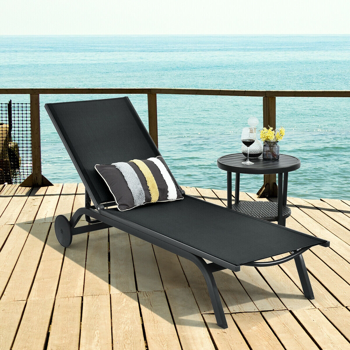 Aluminum Fabric Outdoor Patio Lounge Chair with Adjustable Reclining -Black on wooden deck by the sea
